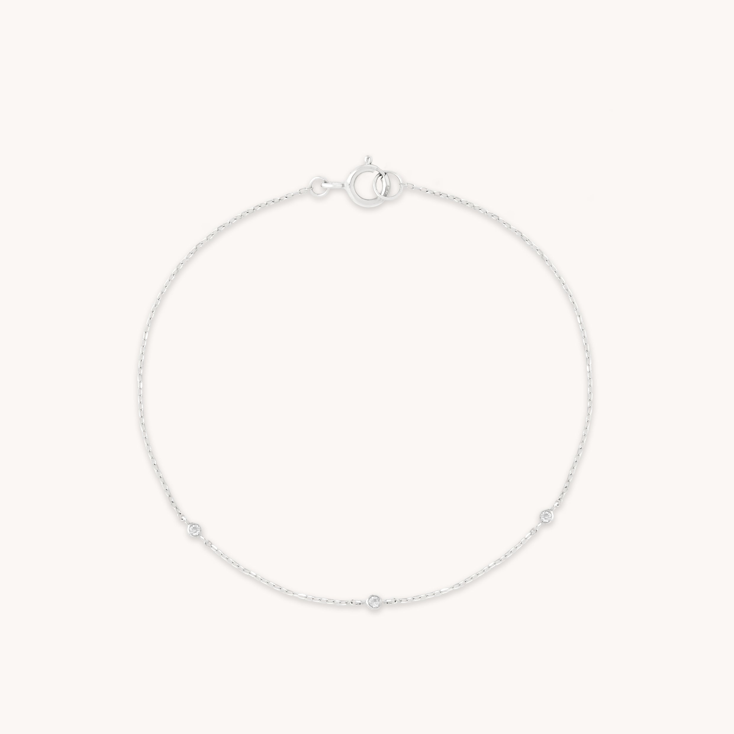 Topaz Charm Bracelet in Solid White Gold