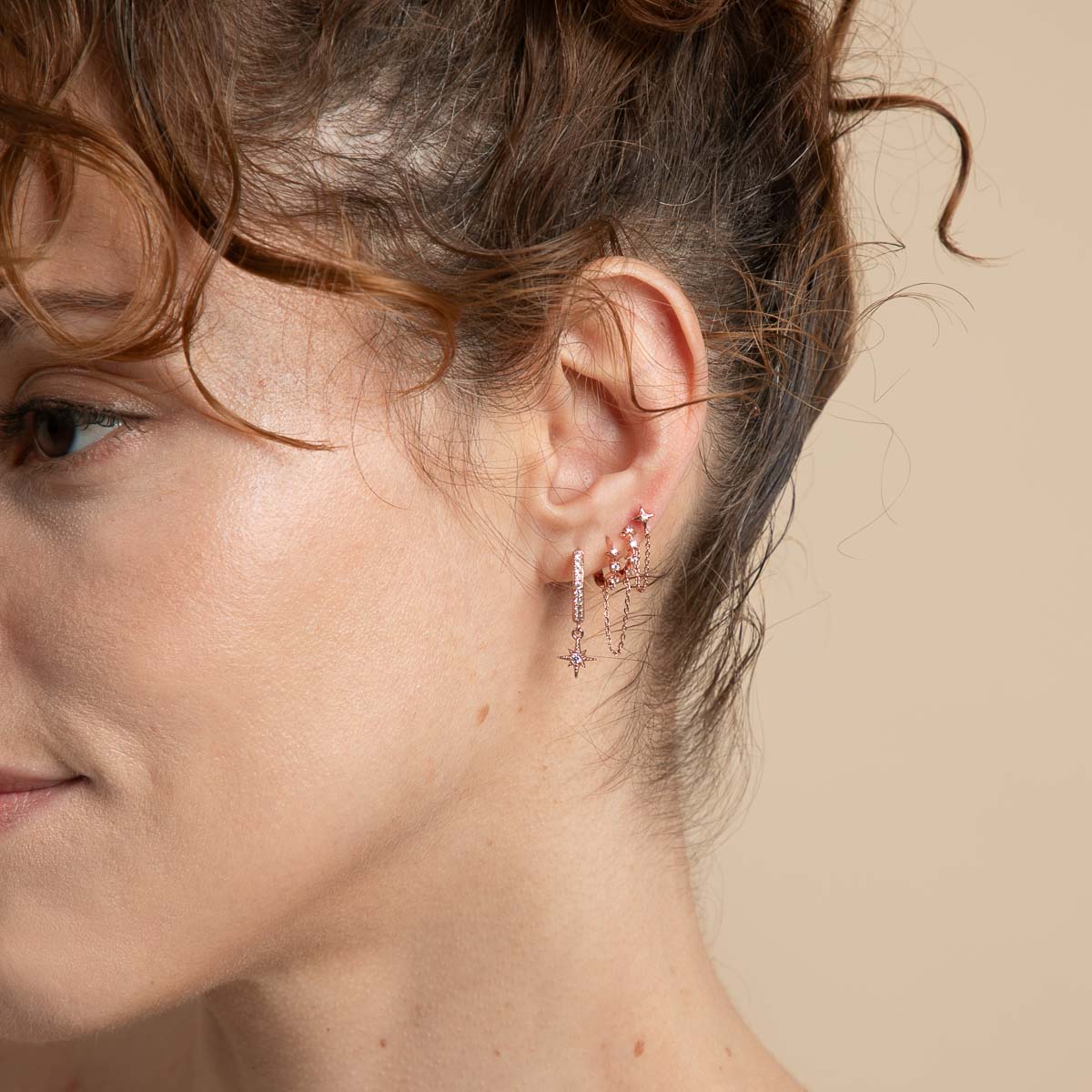 Cosmic Star Chain Huggies in Rose Gold