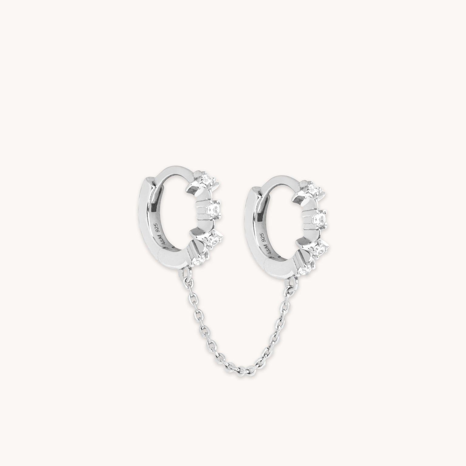 Cosmic Star Chain Huggies in Silver