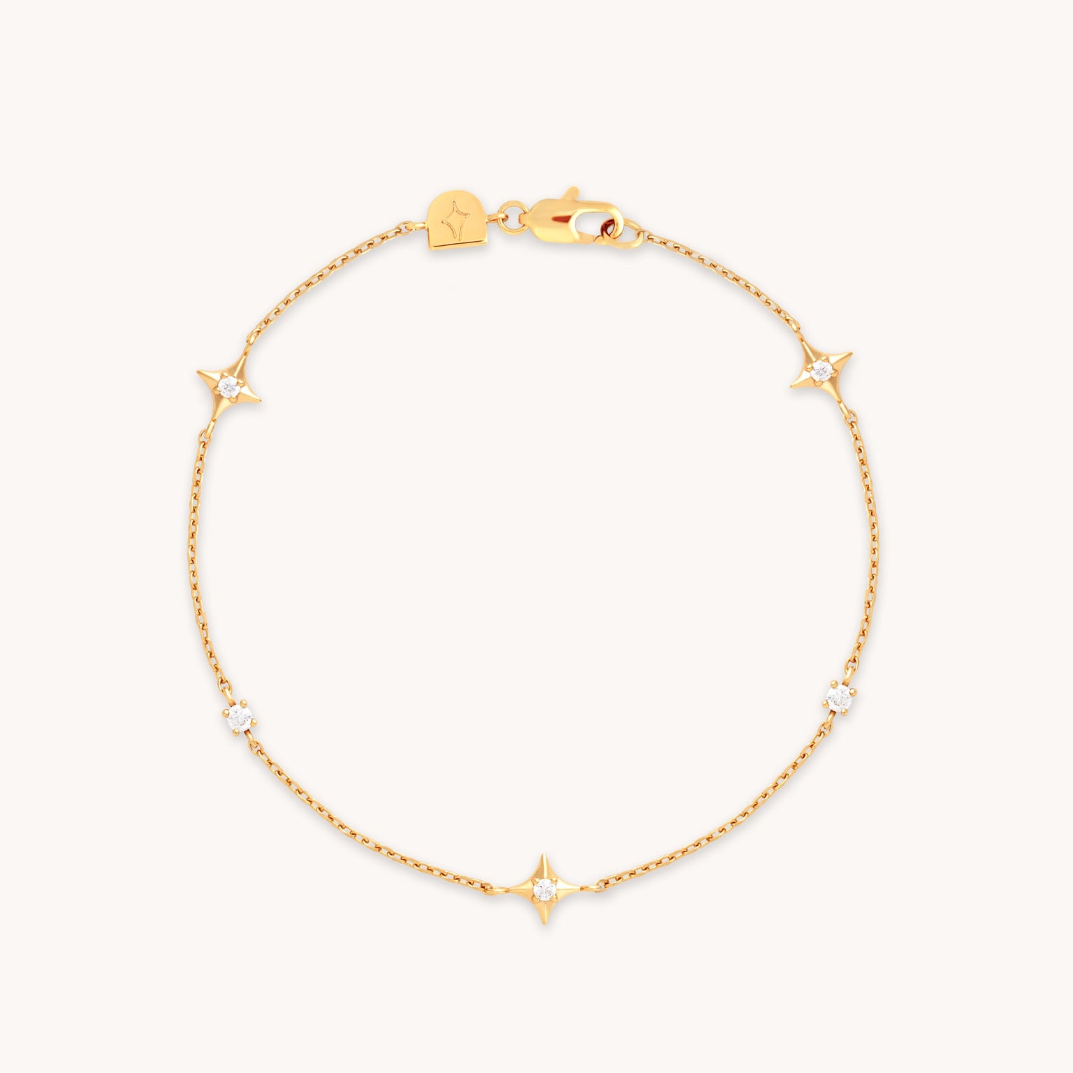 Cosmic Star Charm Bracelet in Gold