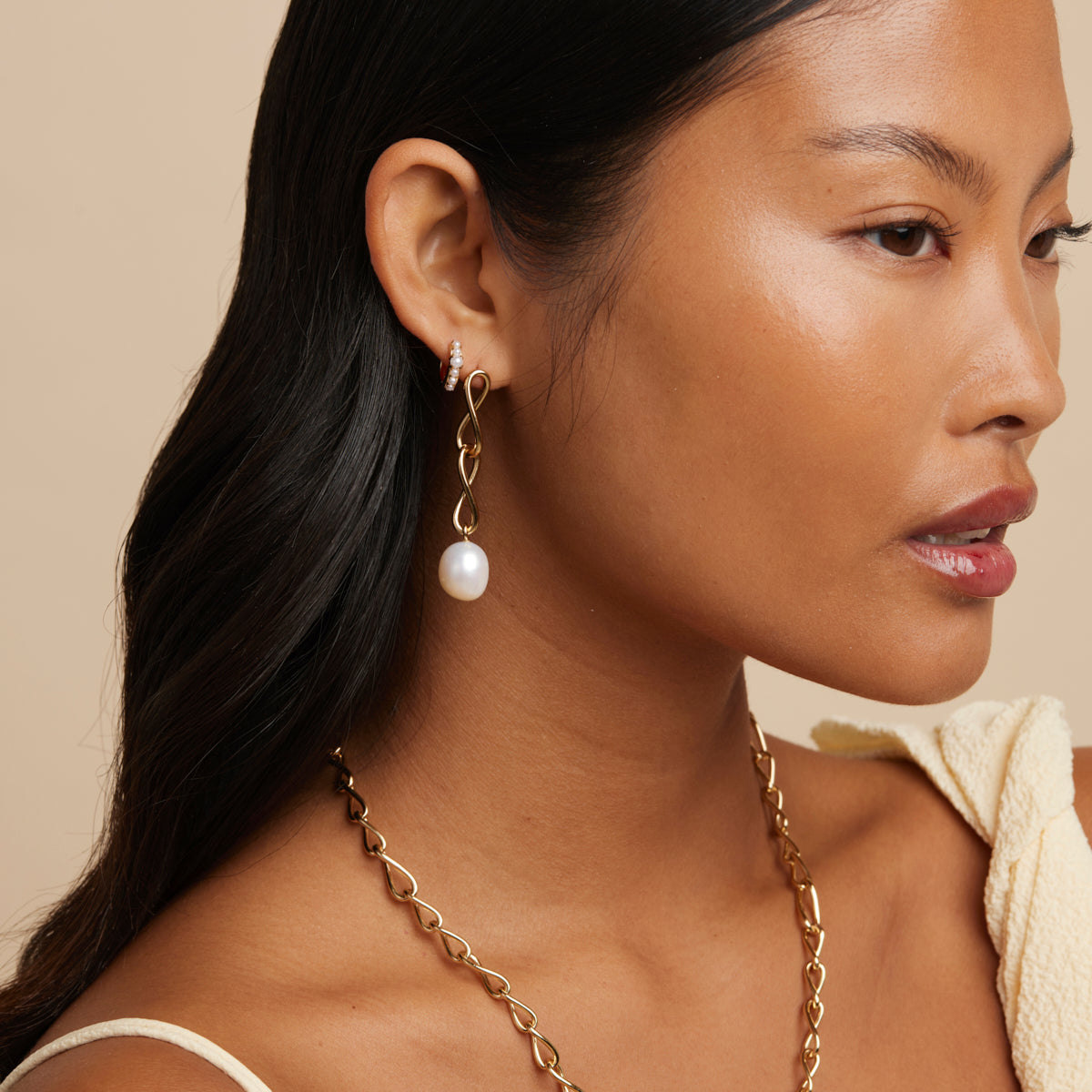 Infinite Pearl Drop Studs in Gold