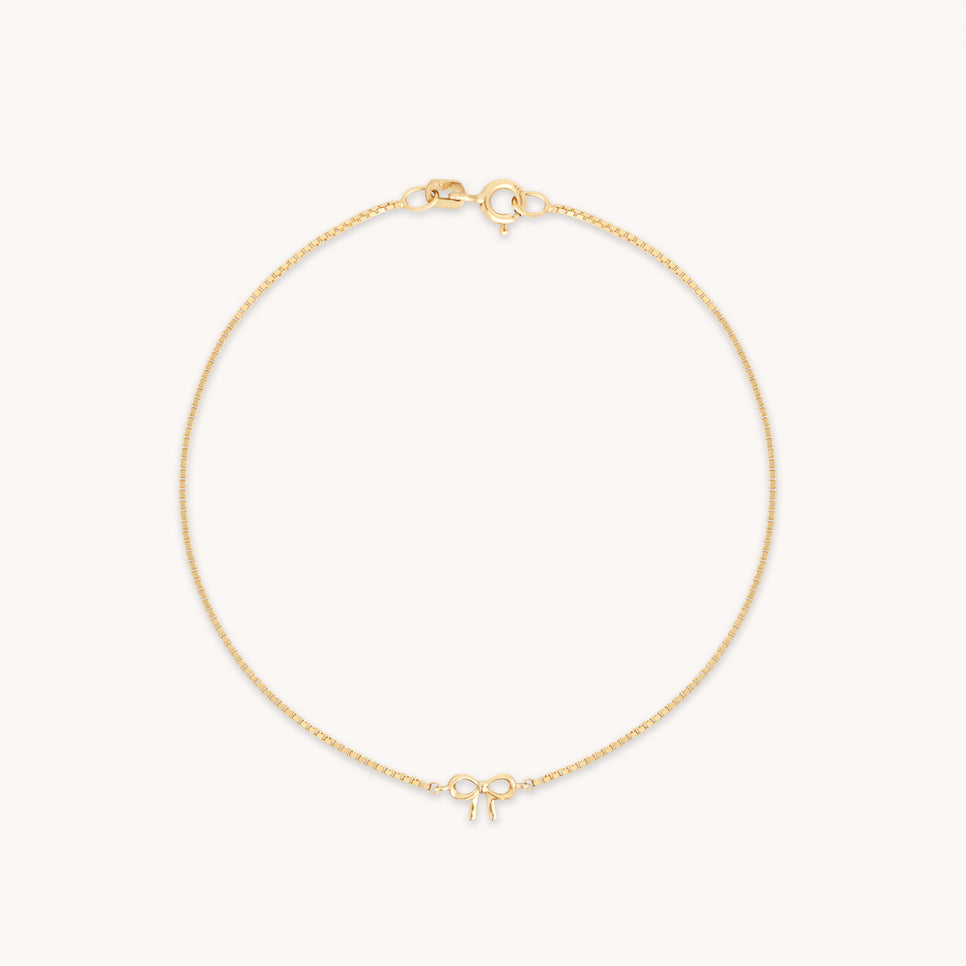 Bow Charm Bracelet in Solid Gold