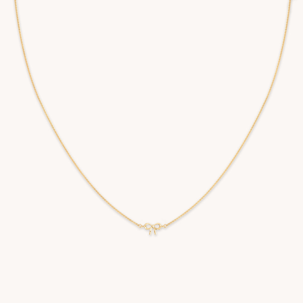 Bow Charm Necklace in Solid Gold