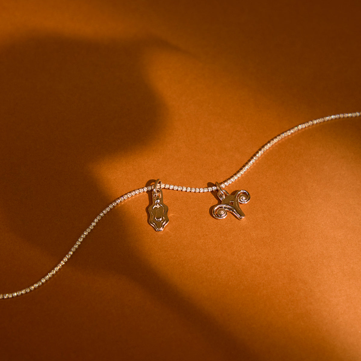 A&M x Hertility Uterus Charm