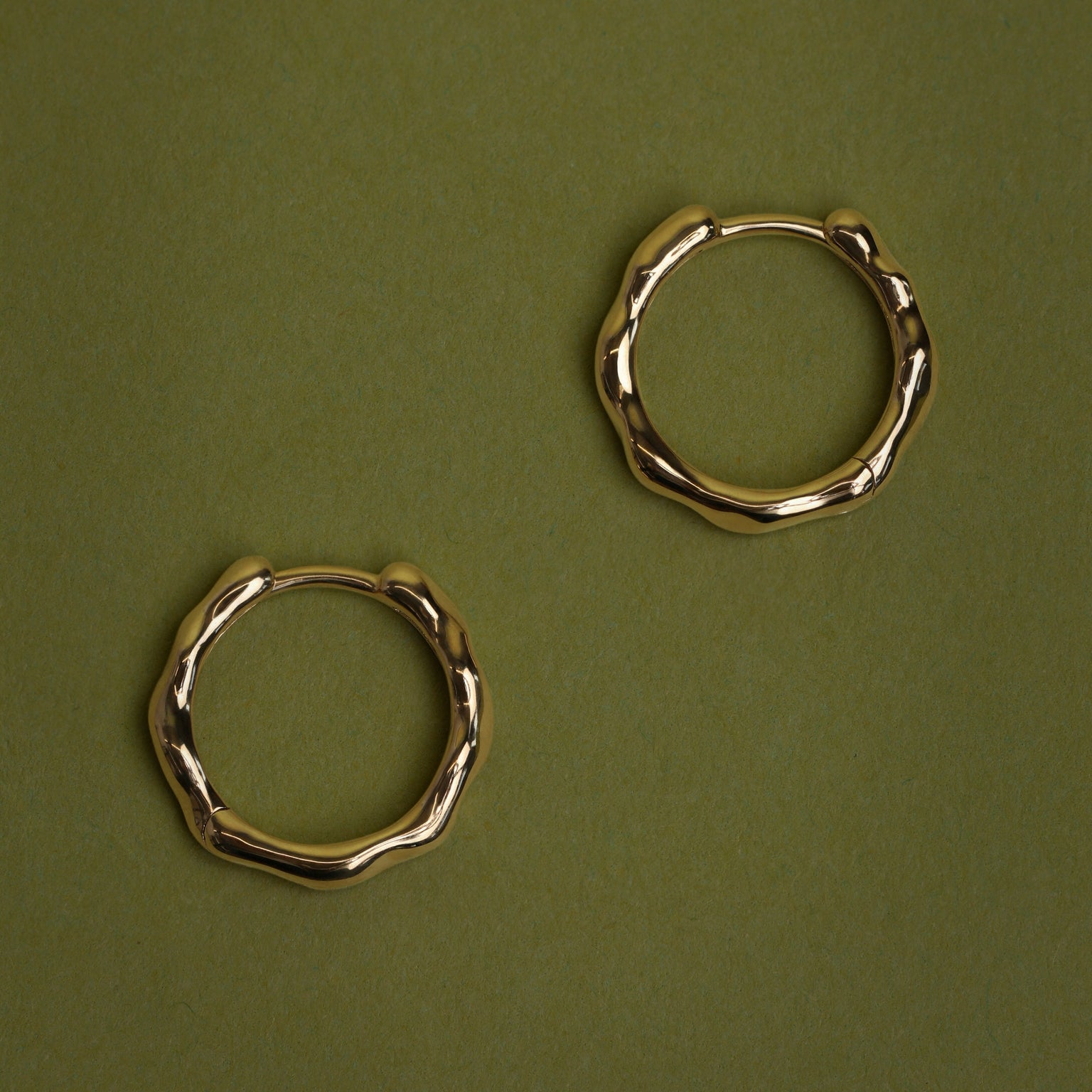 Molten Hoops in Solid Gold
