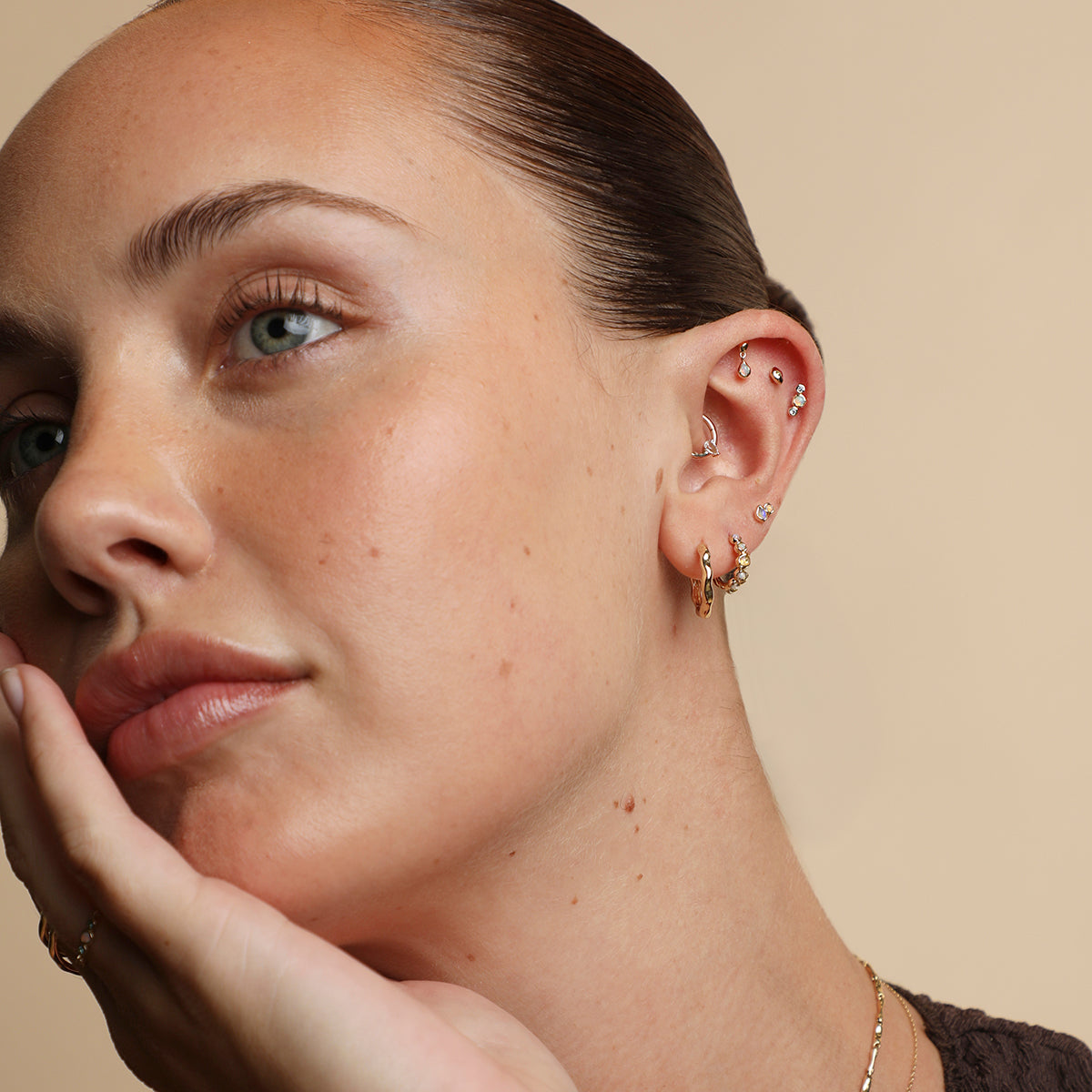Opal Pear Bezel Huggies in Solid Gold