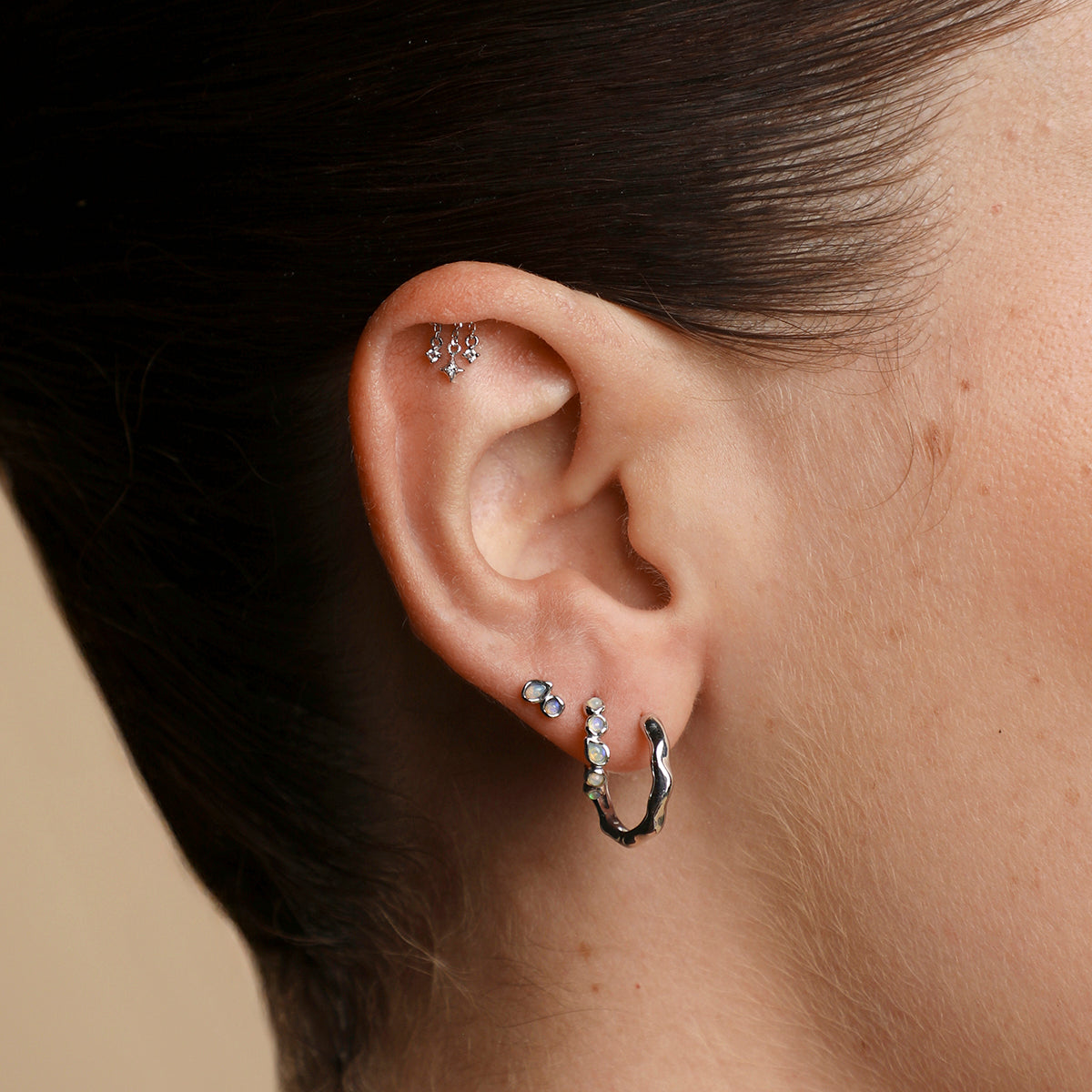 Opal Pear Bezel Huggies in Solid White Gold