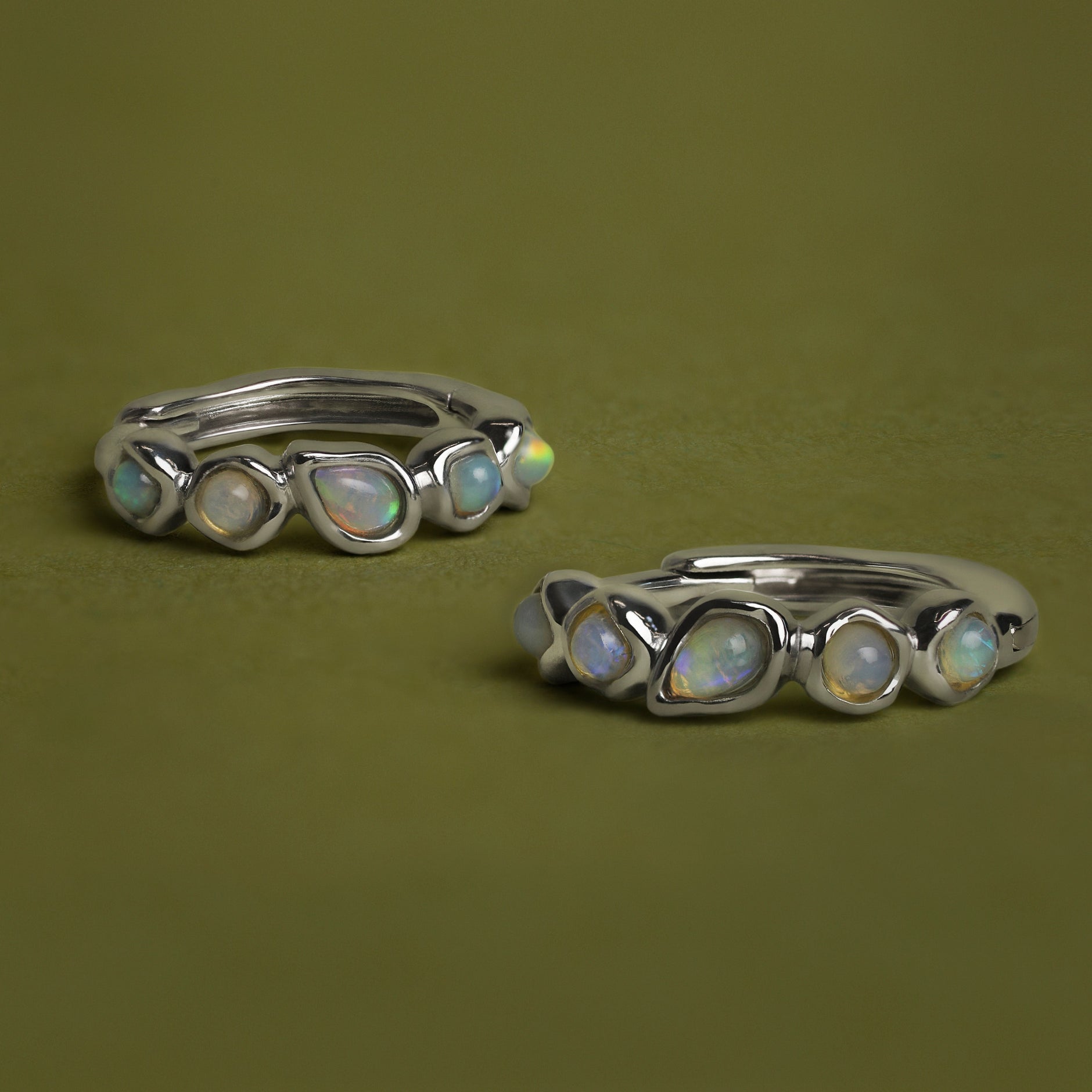 Opal Pear Bezel Huggies in Solid White Gold