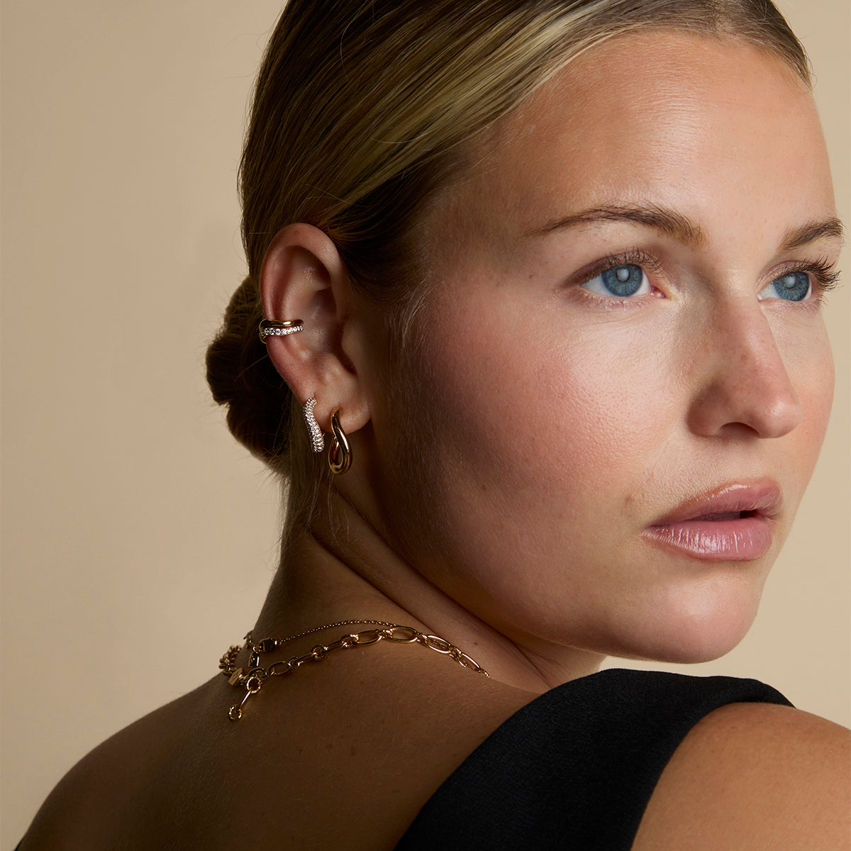 Wave Crystal Hoops in Gold