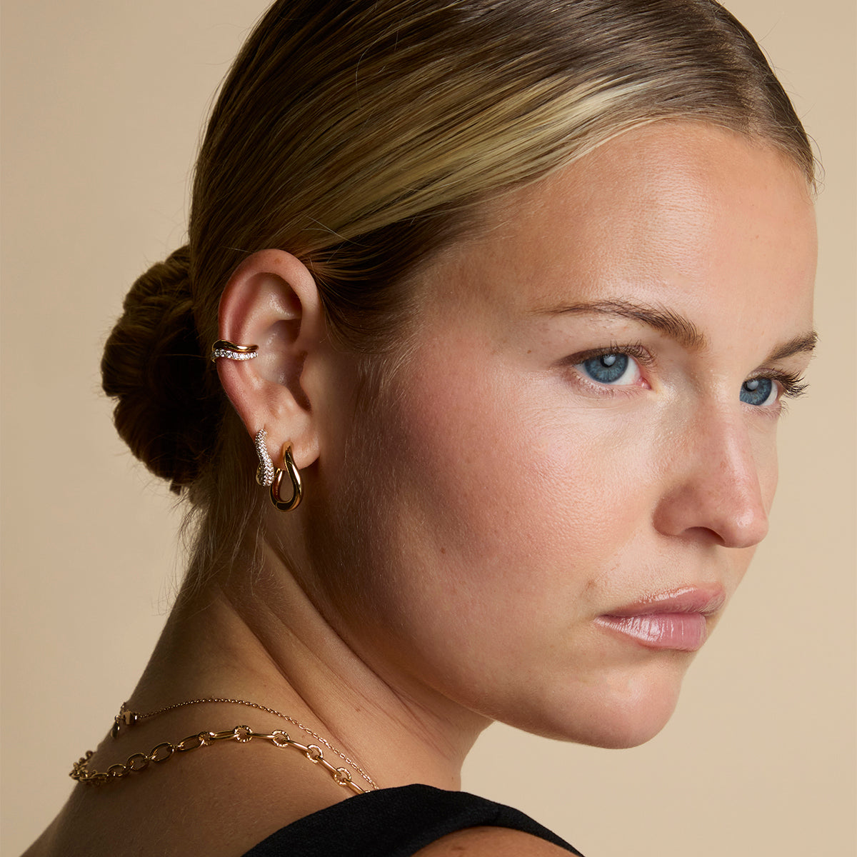 Wave Crystal Hoops in Gold