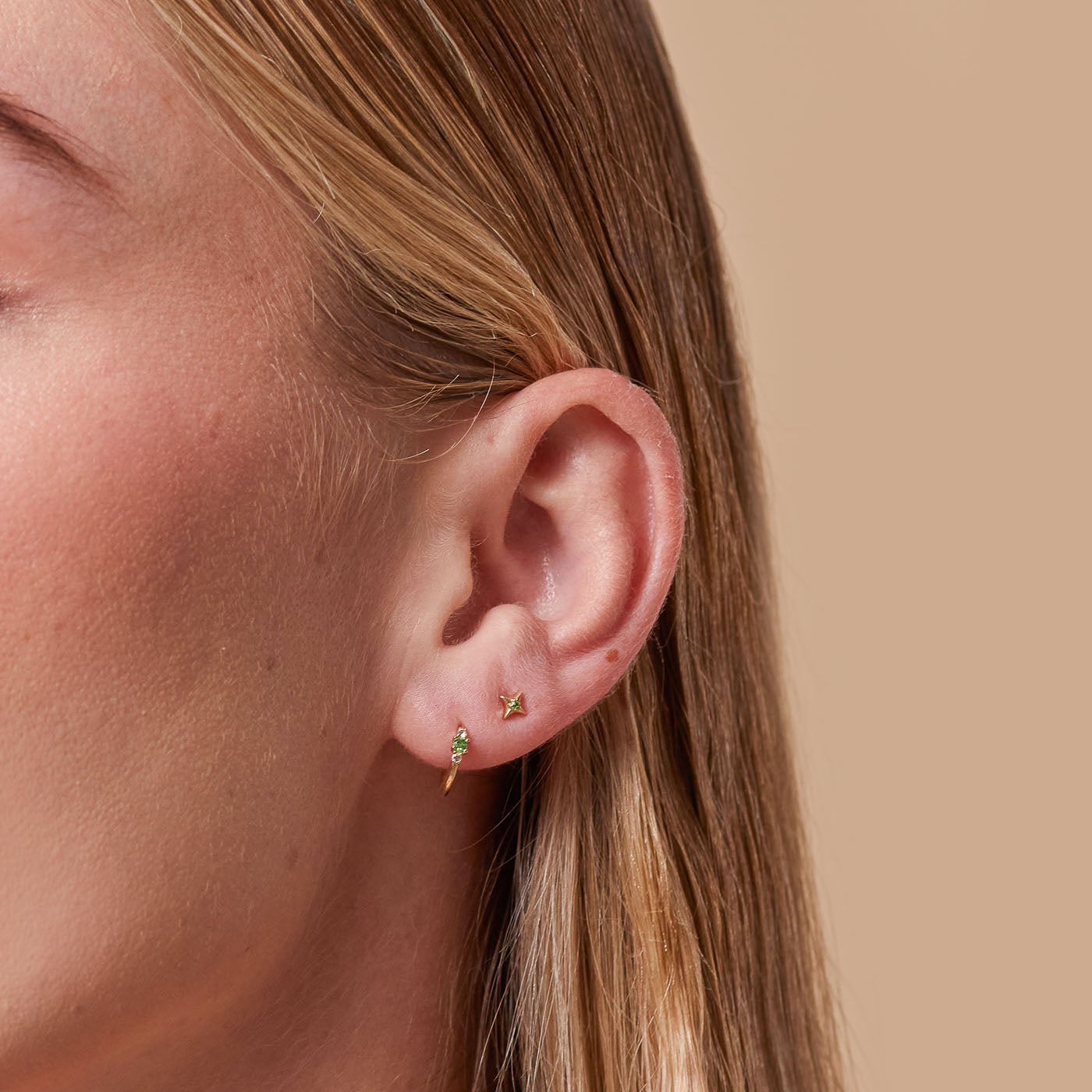 Tsavorite Hoops in Solid Gold worn