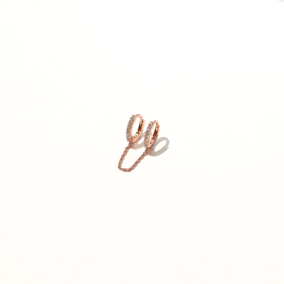 Chain Link Huggies in Rose Gold flat lay