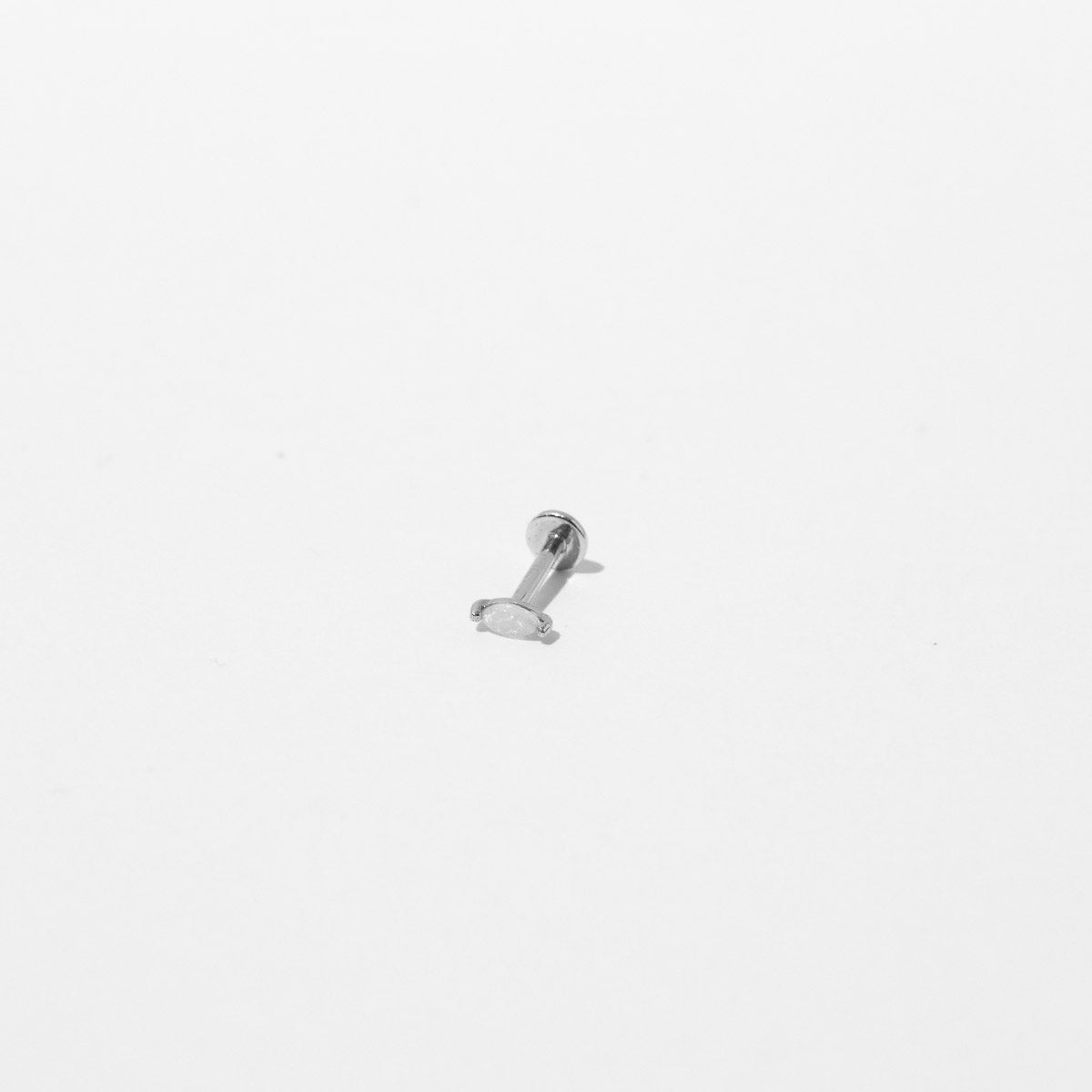 Opal Marquise Piercing Stud in Solid White Gold flat lay shot