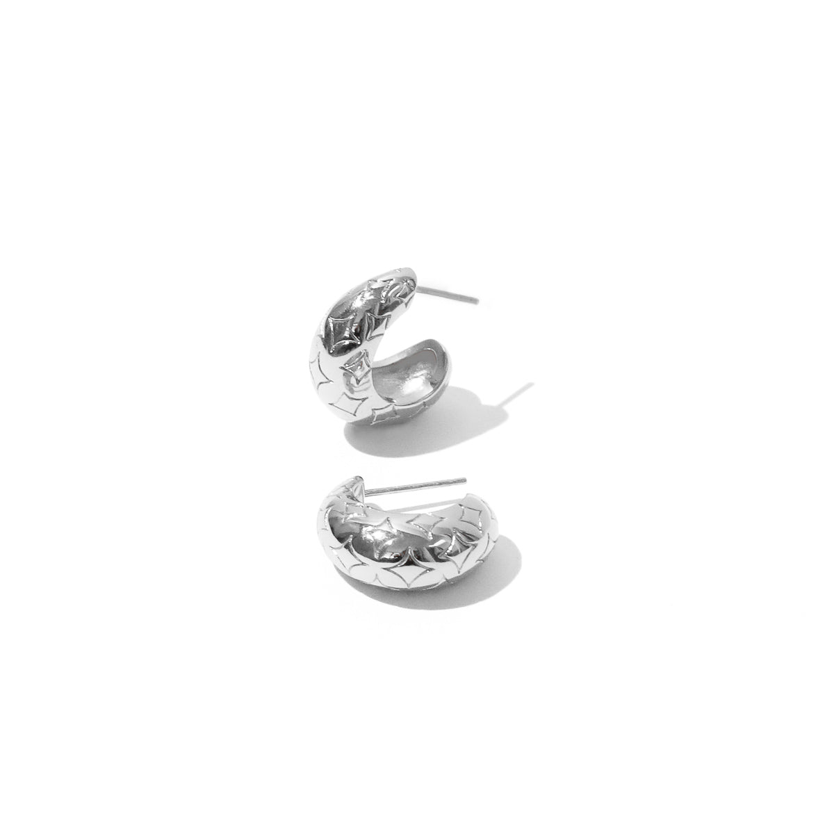 Cosmic Star Large Hoops in Silver flat lay shot