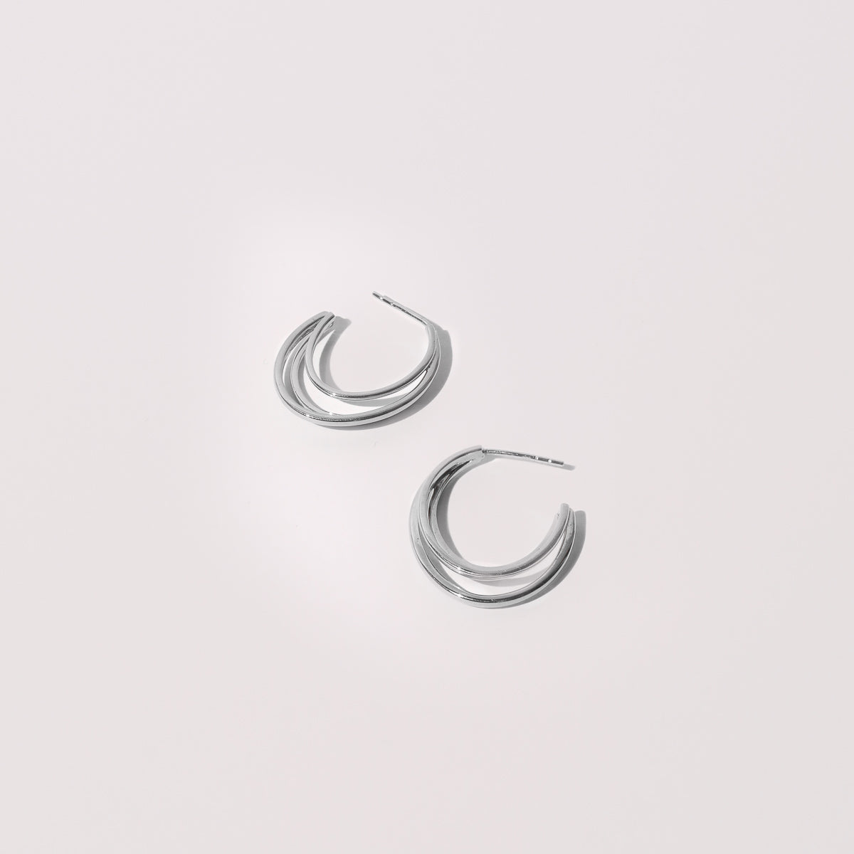 Orbit Hoops in Silver Flat Lay