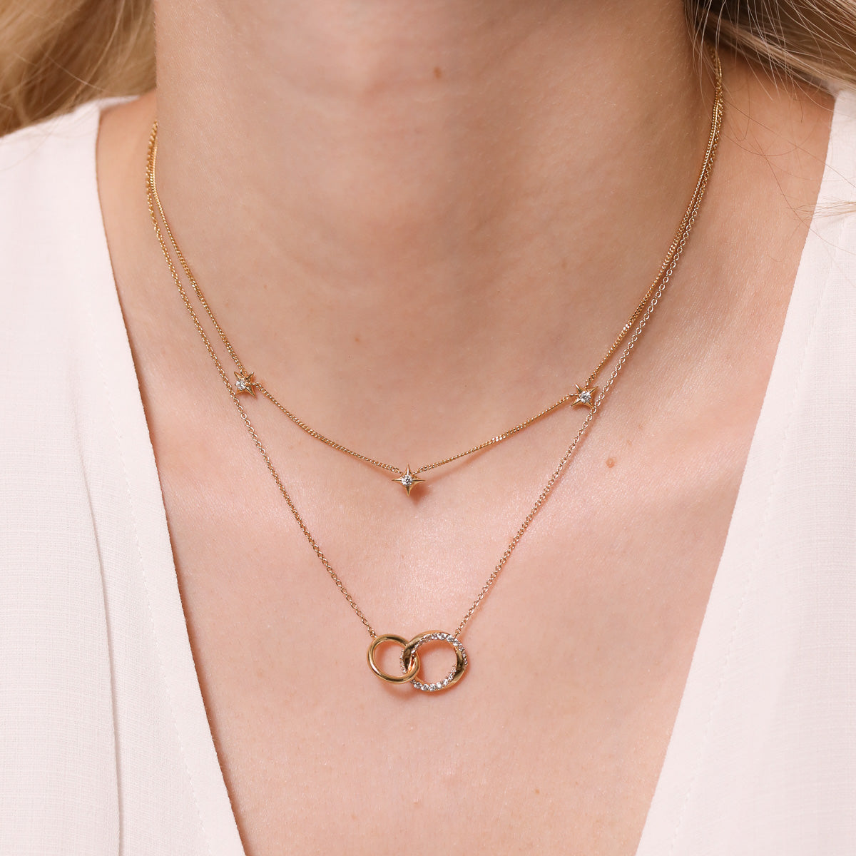 Orbit Crystal Chain Necklace worn stacked with Cosmic Star Charm Necklace
