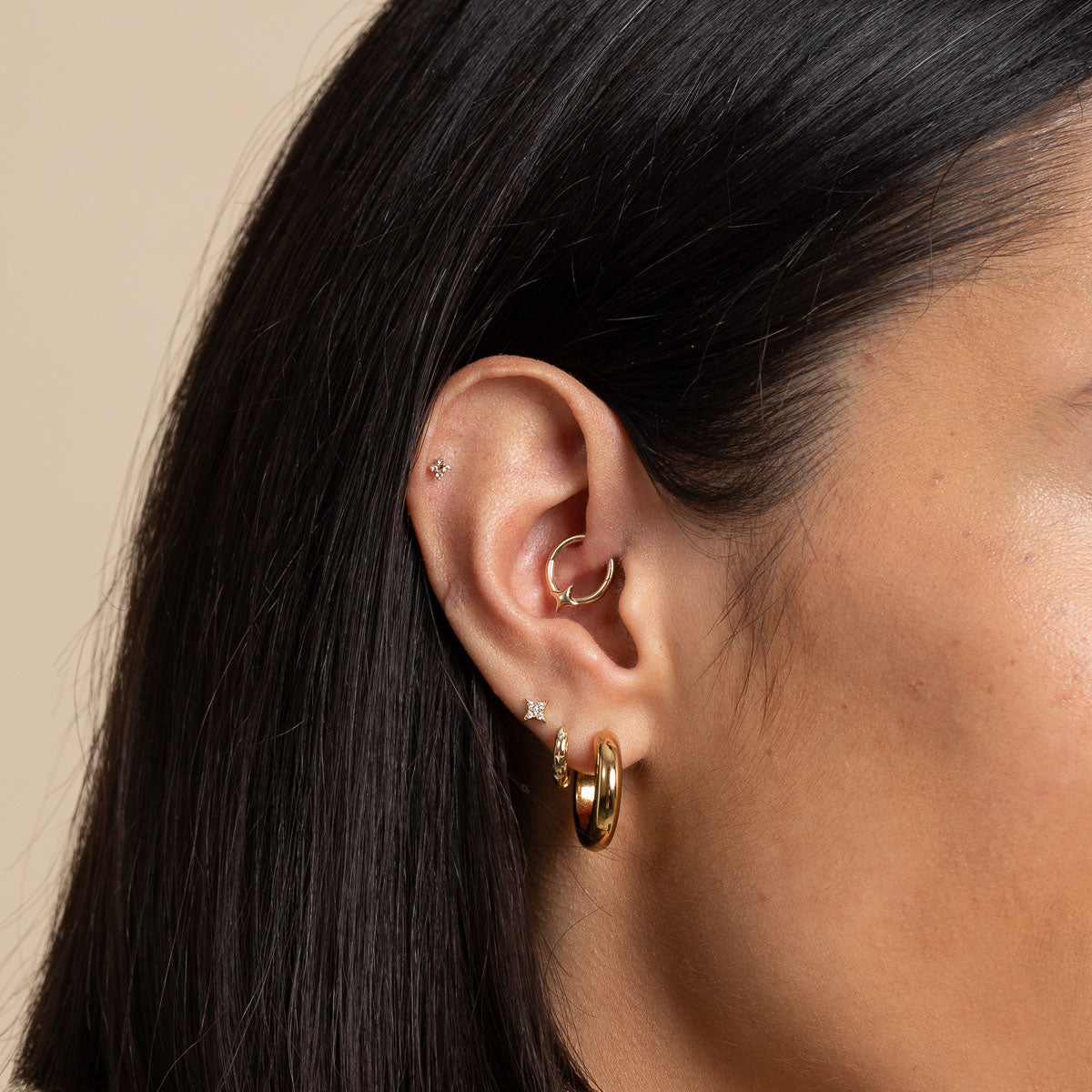 Cosmic Star Daith Hoop in Solid Gold