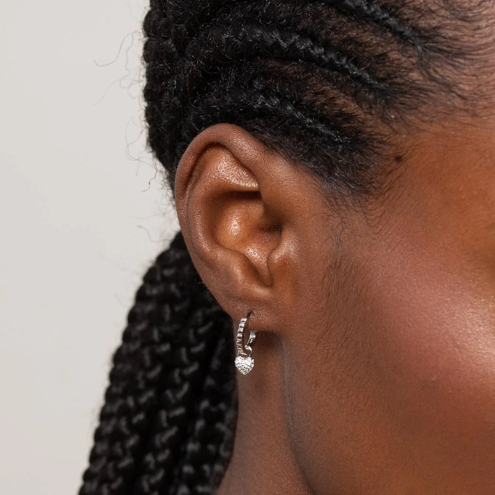 Heart Pave Charm Huggies in Silver worn