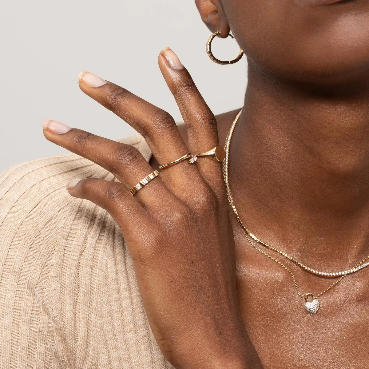 Pleated Crystal Ring in Silver worn with other rings