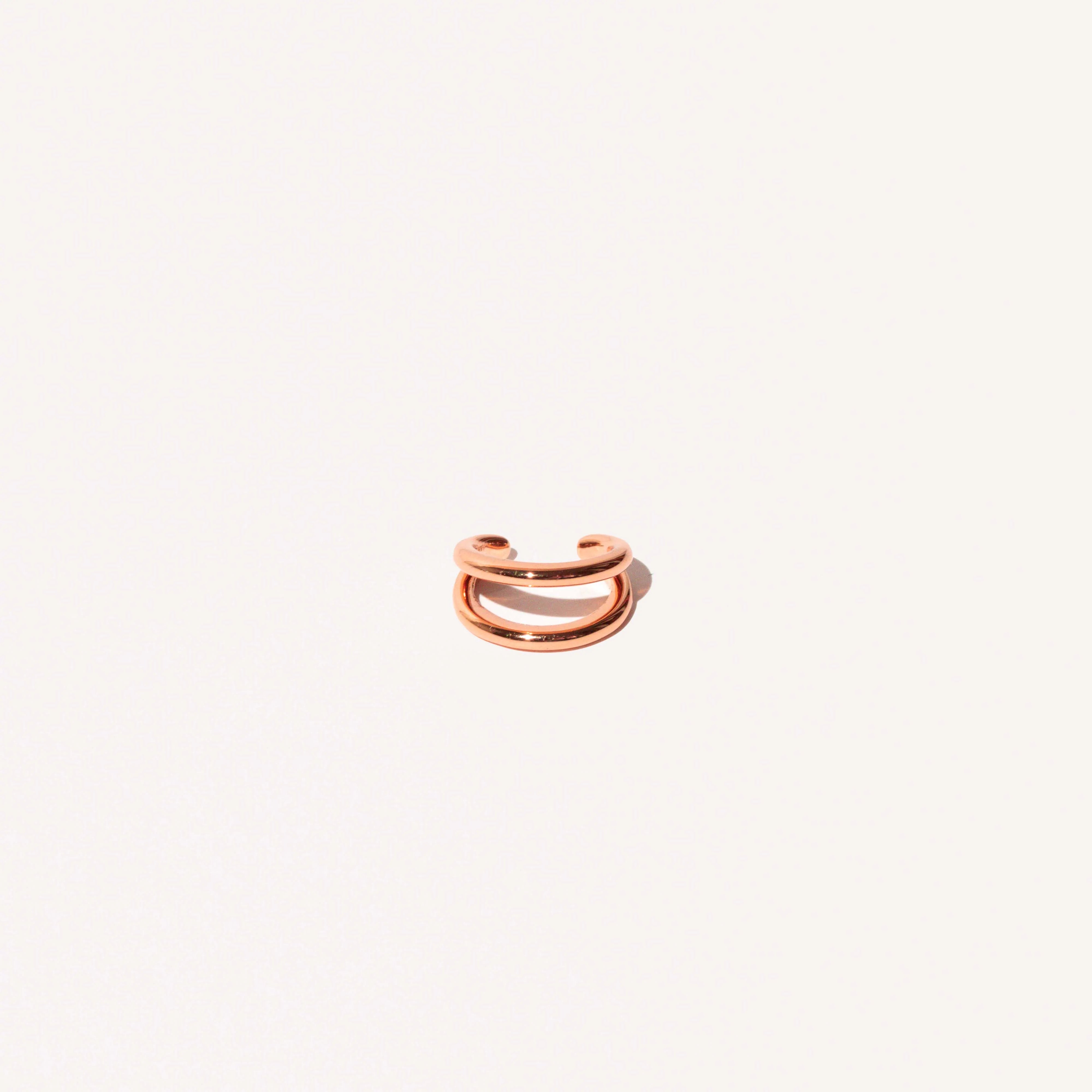 Illusion Essential Ear Cuff in Rose Gold flat lay