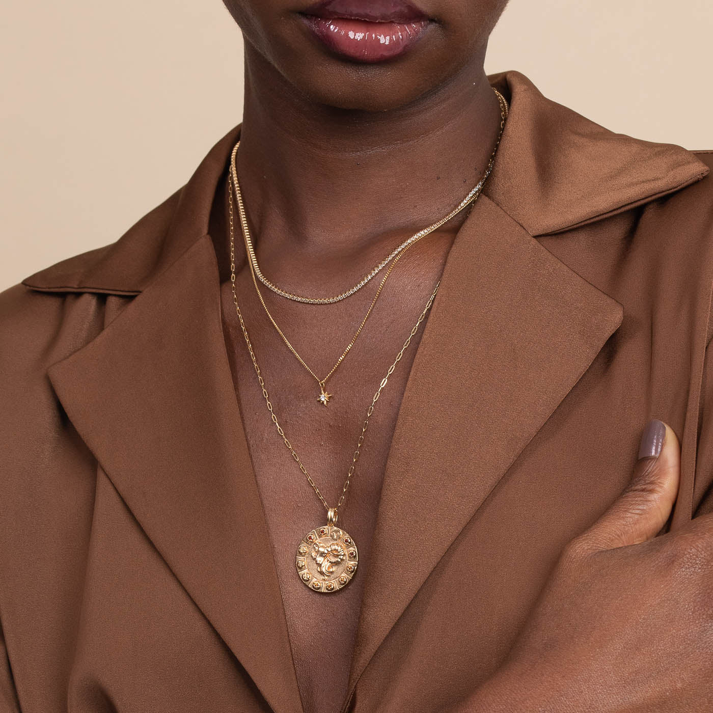 Aries Bold Zodiac Pendant Necklace in gold Worn