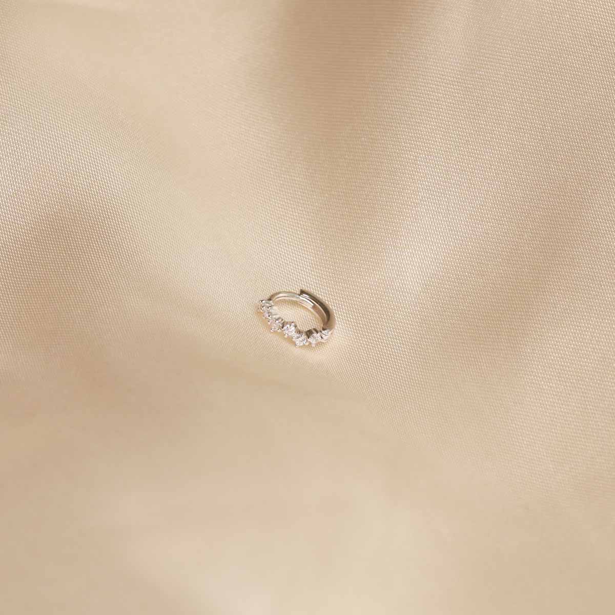 Flat lay image of Cluster Hoop 6.5mm in Silver