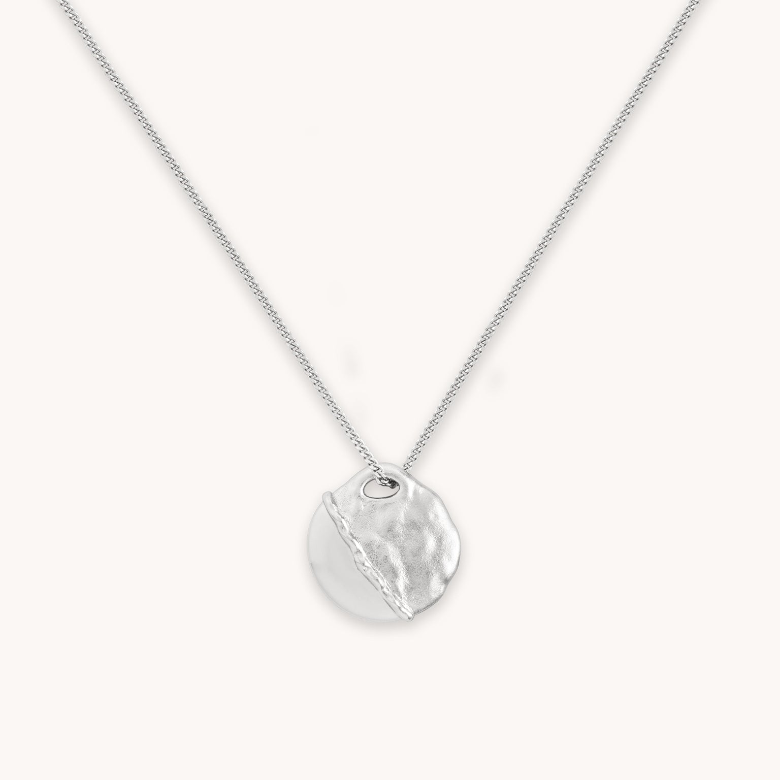 Molten Coin Pendant Necklace in Silver close up shot