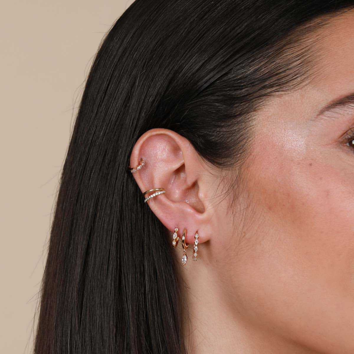 Worn shot of Navette Hoop 6.5mm in Gold in helix piercing