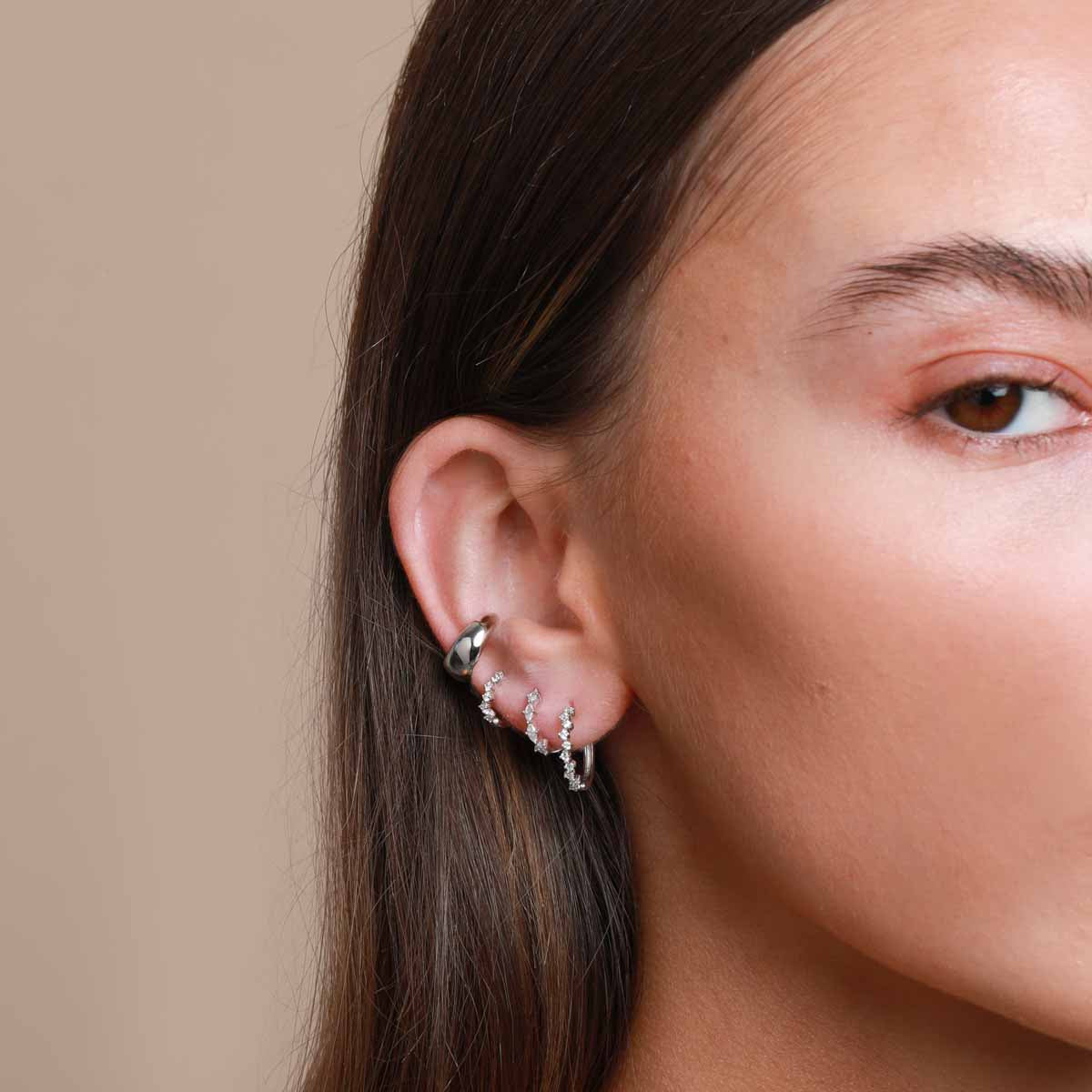 Worn shot of Navette Hoop 8mm in Silver in upper lobe