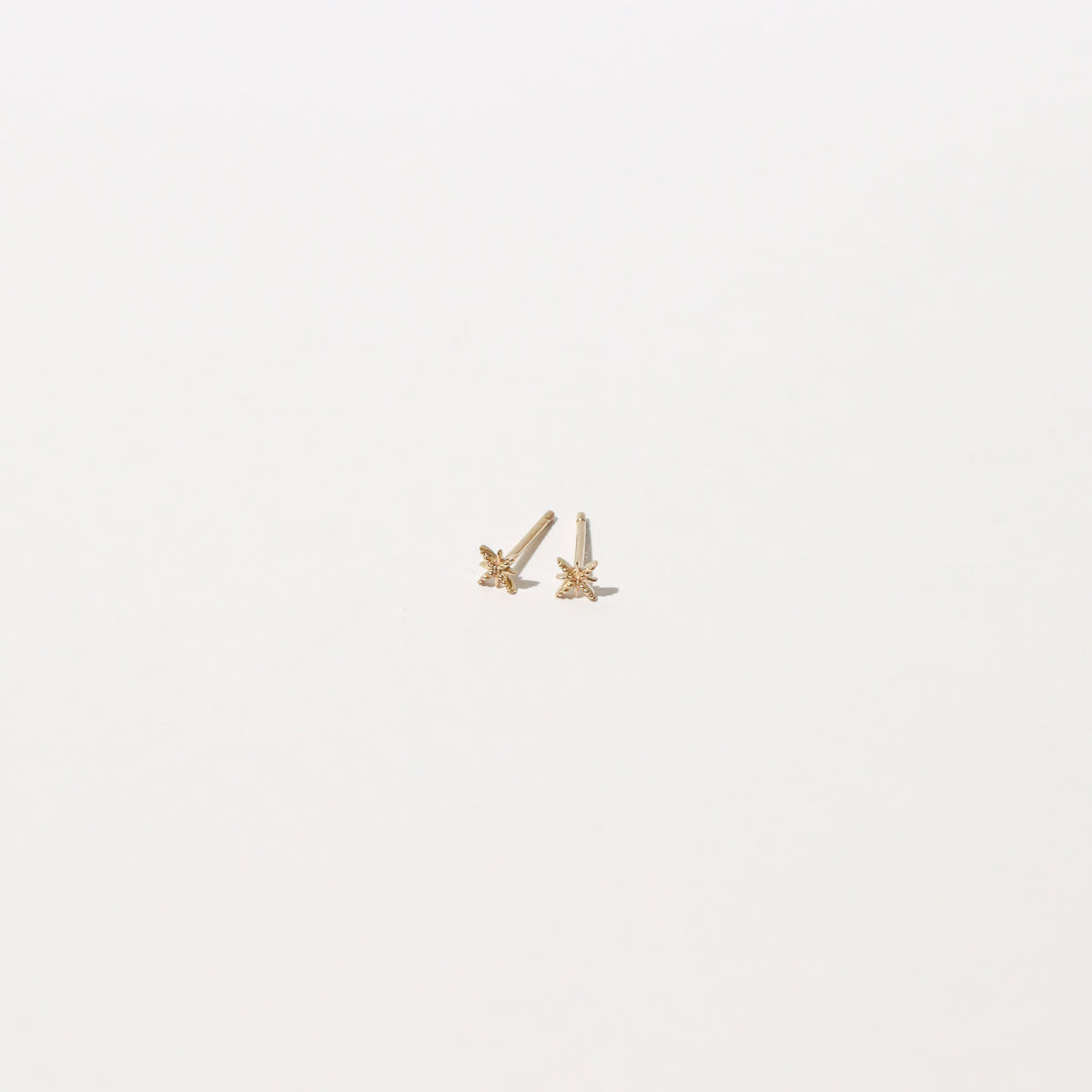 Twilight Stud Earrings in Solid Gold flat lay