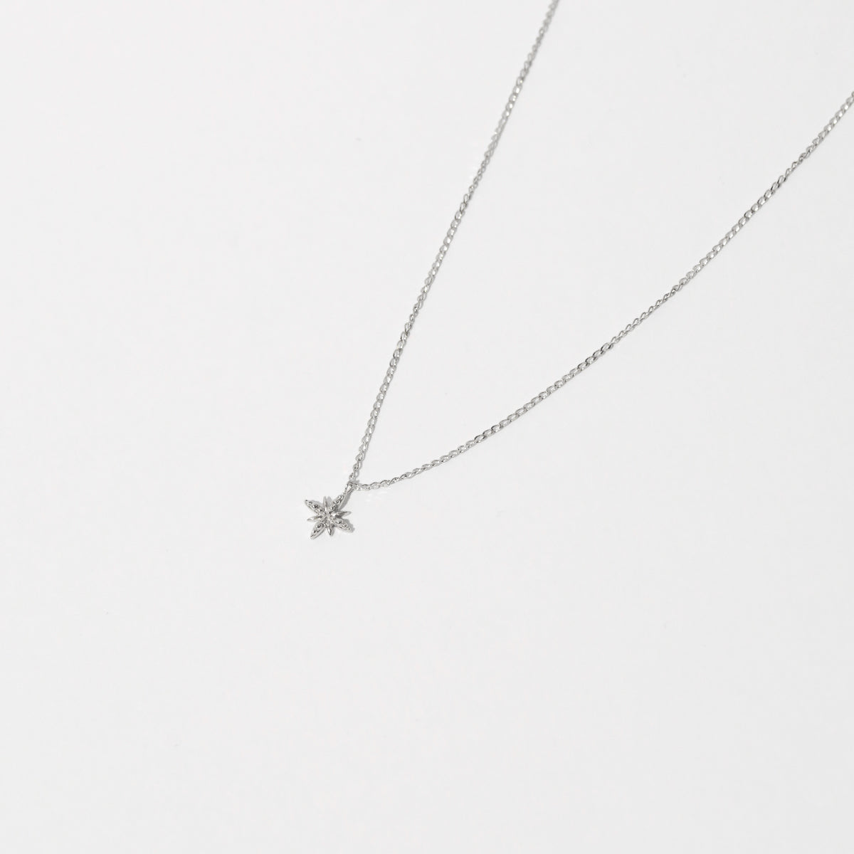 Twilight Pendant Necklace in Solid White Gold flat lay