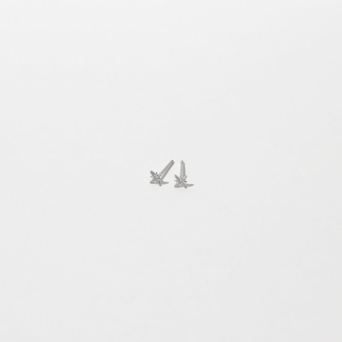 Twilight Stud Earrings in Solid White Gold flat lay