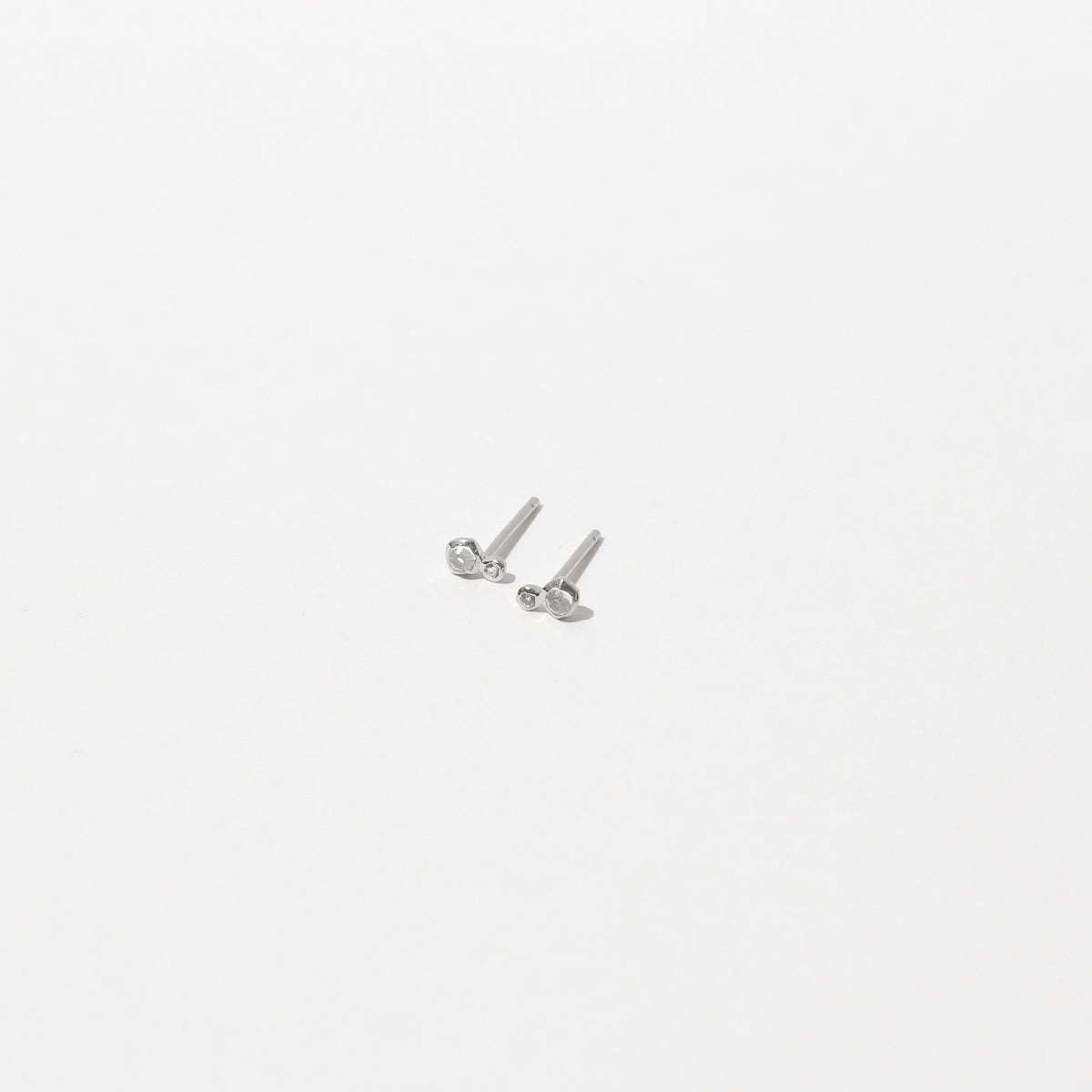 Double Topaz Stud Earrings in Solid White Gold flat lay