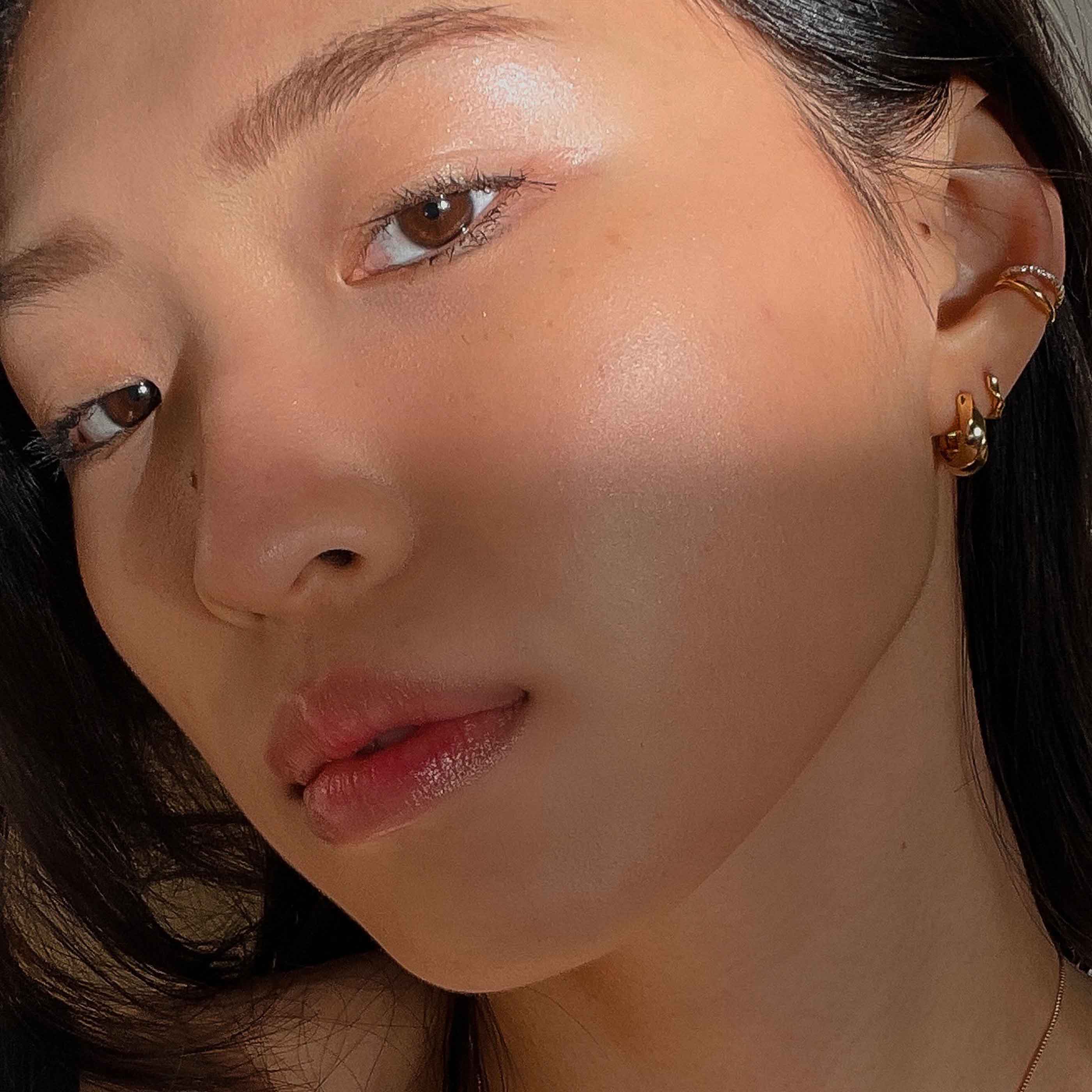 Illusion Crystal Ear Cuff in Gold worn with elemental hoops