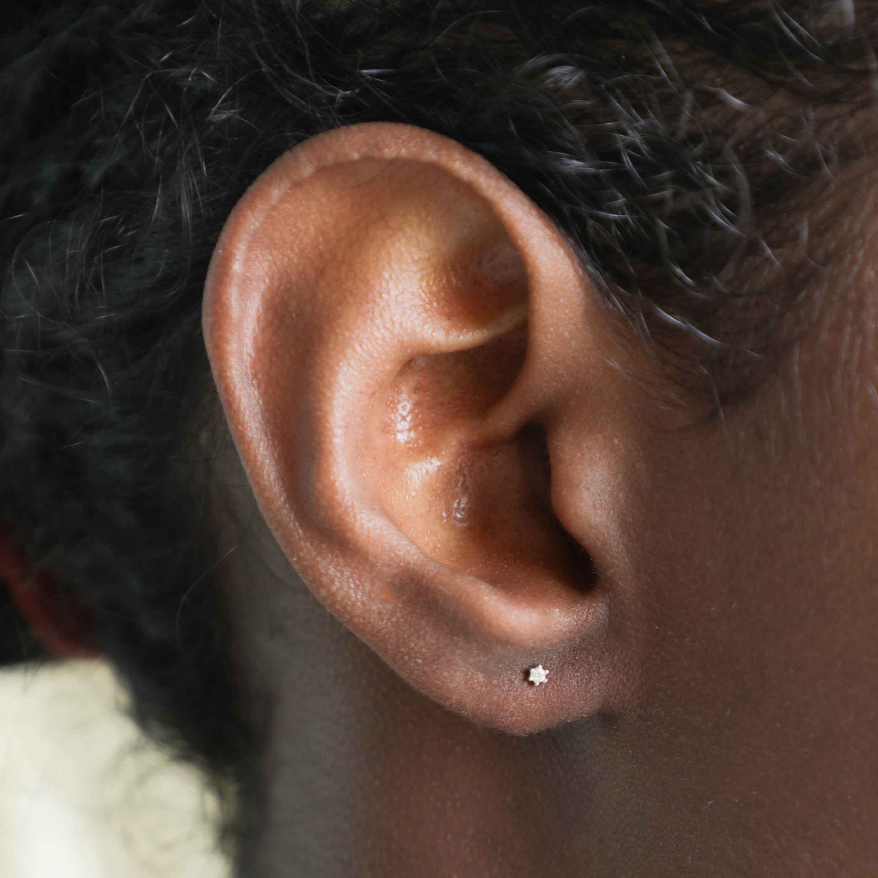 Flora Tiny Barbell in Silver worn shot