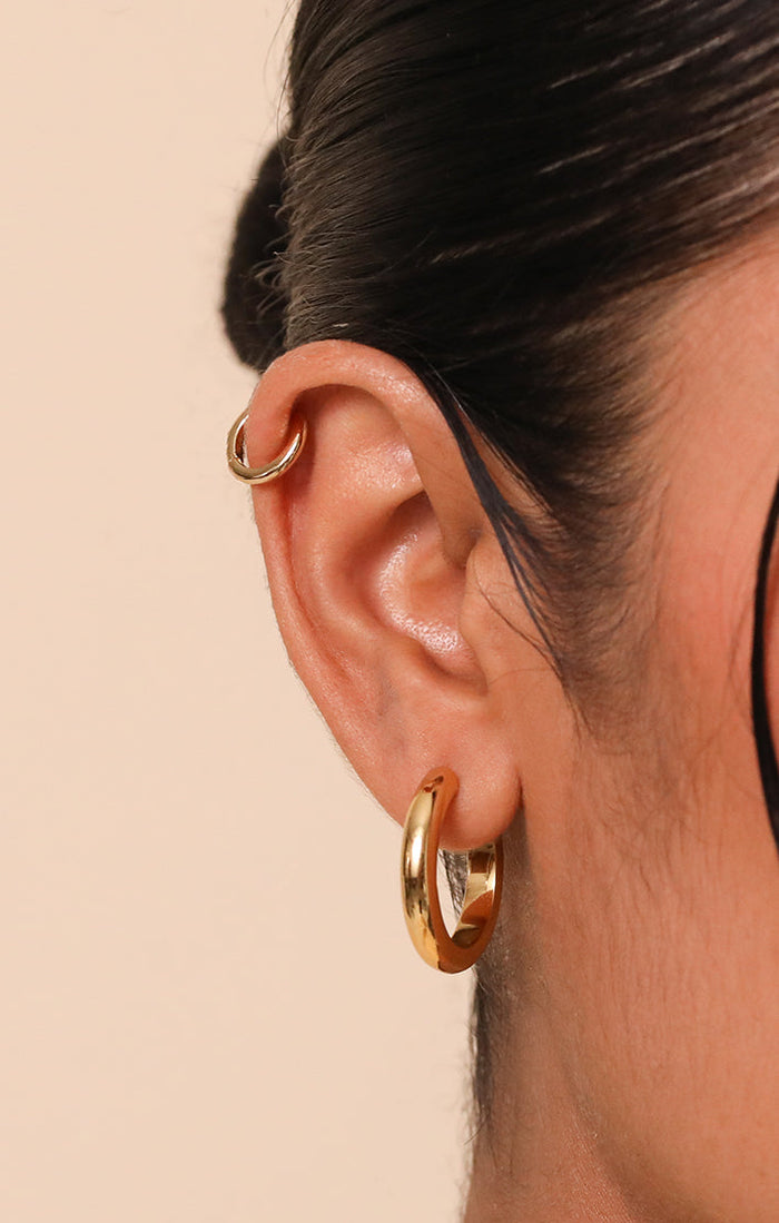 Helix worn shot gold piercing jewellery