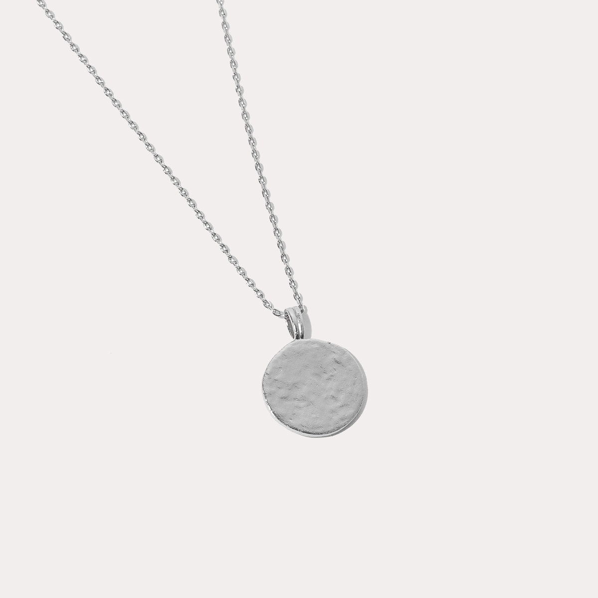 Close up shot of the back of the Taurus Zodiac Pendant Necklace in Silver