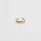 Wave Ear Cuff in Gold flat lay