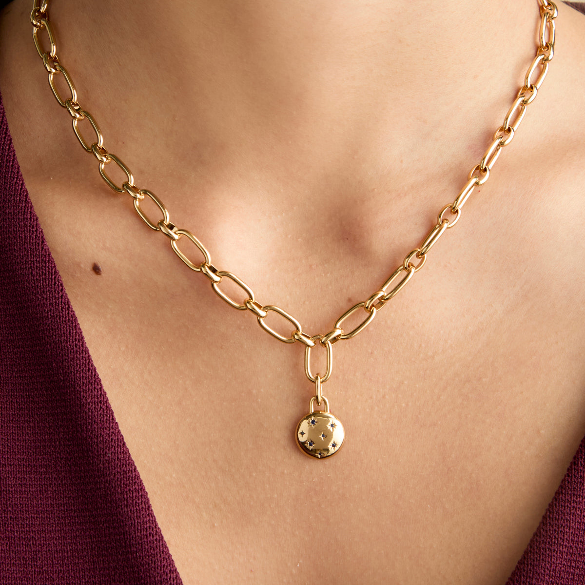 Cosmic Coin Clip Charm in Gold