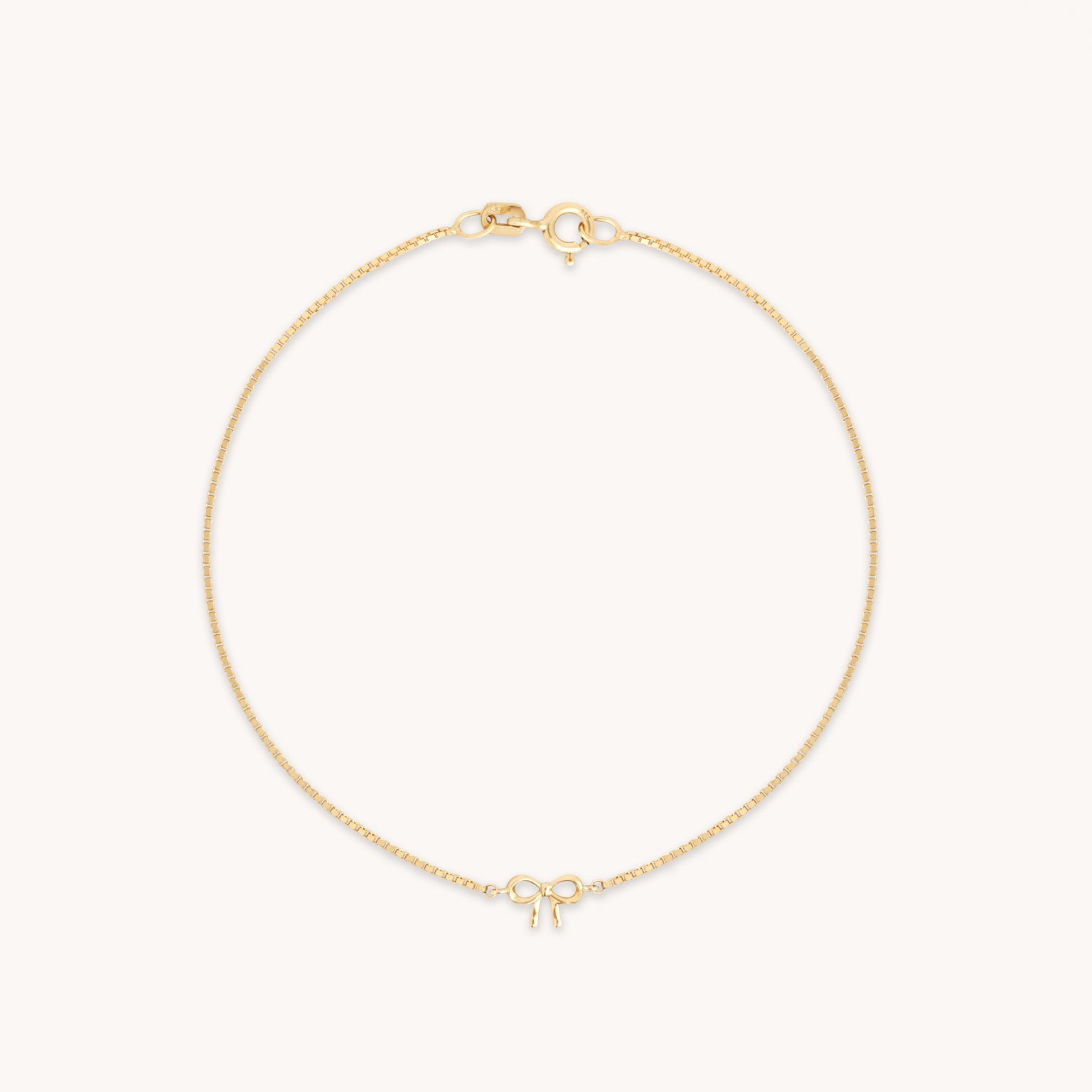 Bow Charm Bracelet in Solid Gold