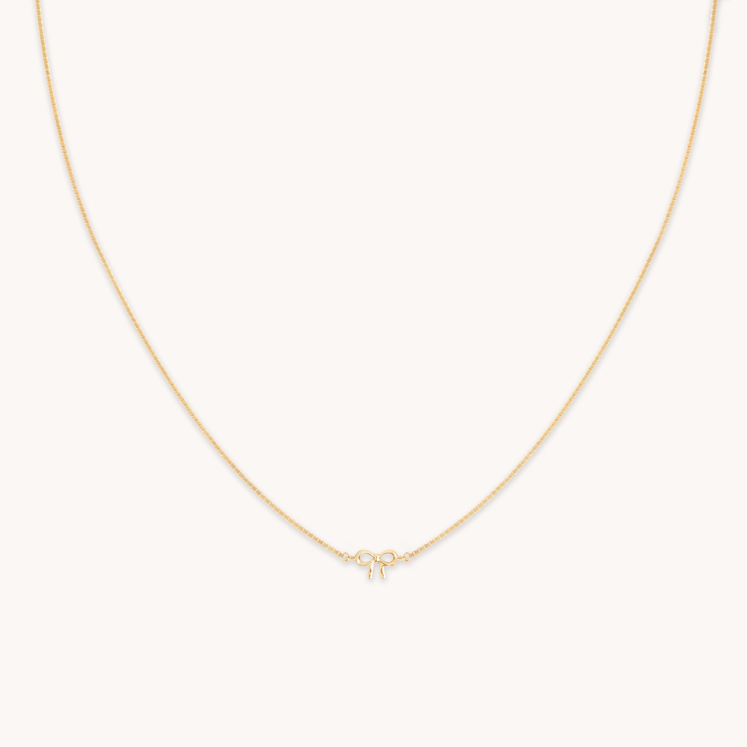 Bow Charm Necklace in Solid Gold