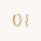 Opal Pear Bezel Huggies in Solid Gold