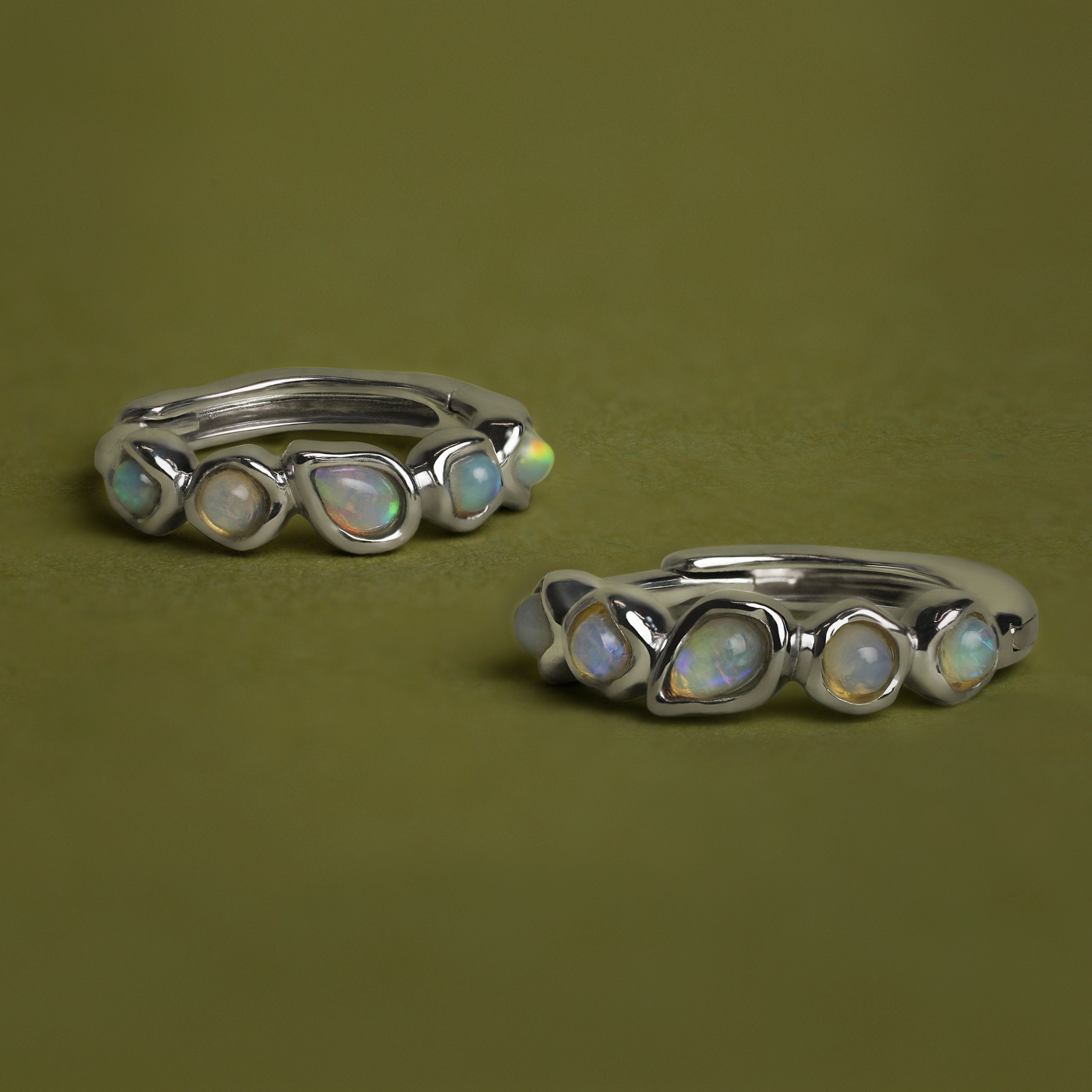 Opal Pear Bezel Huggies in Solid White Gold