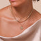 Virgo Zodiac Pendant Necklace in Gold worn layered with necklaces