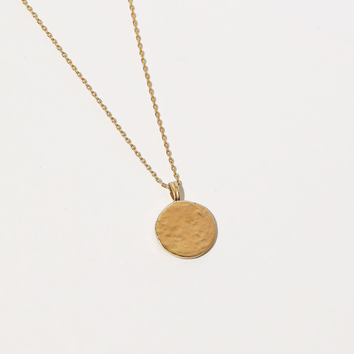 Close up shot of the back of the Gemini Zodiac Pendant Necklace in Gold