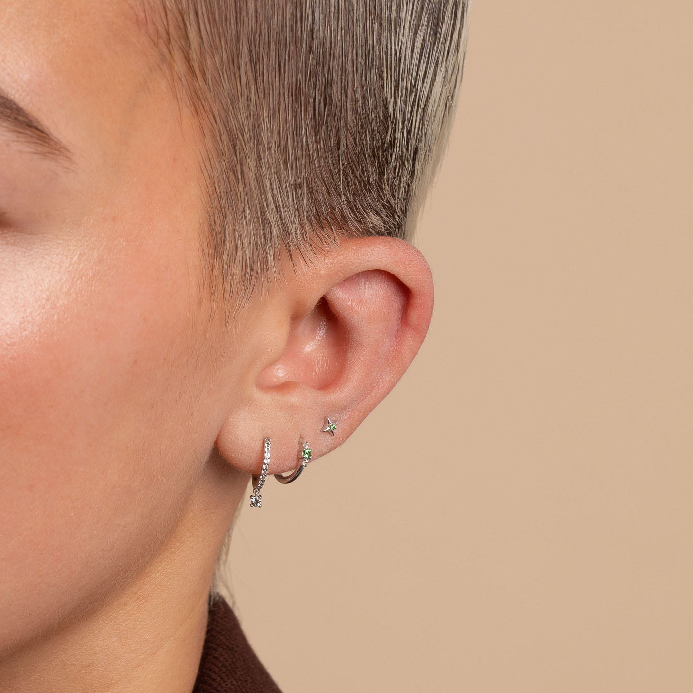 Tsavorite Stud Earrings in Solid White Gold worn