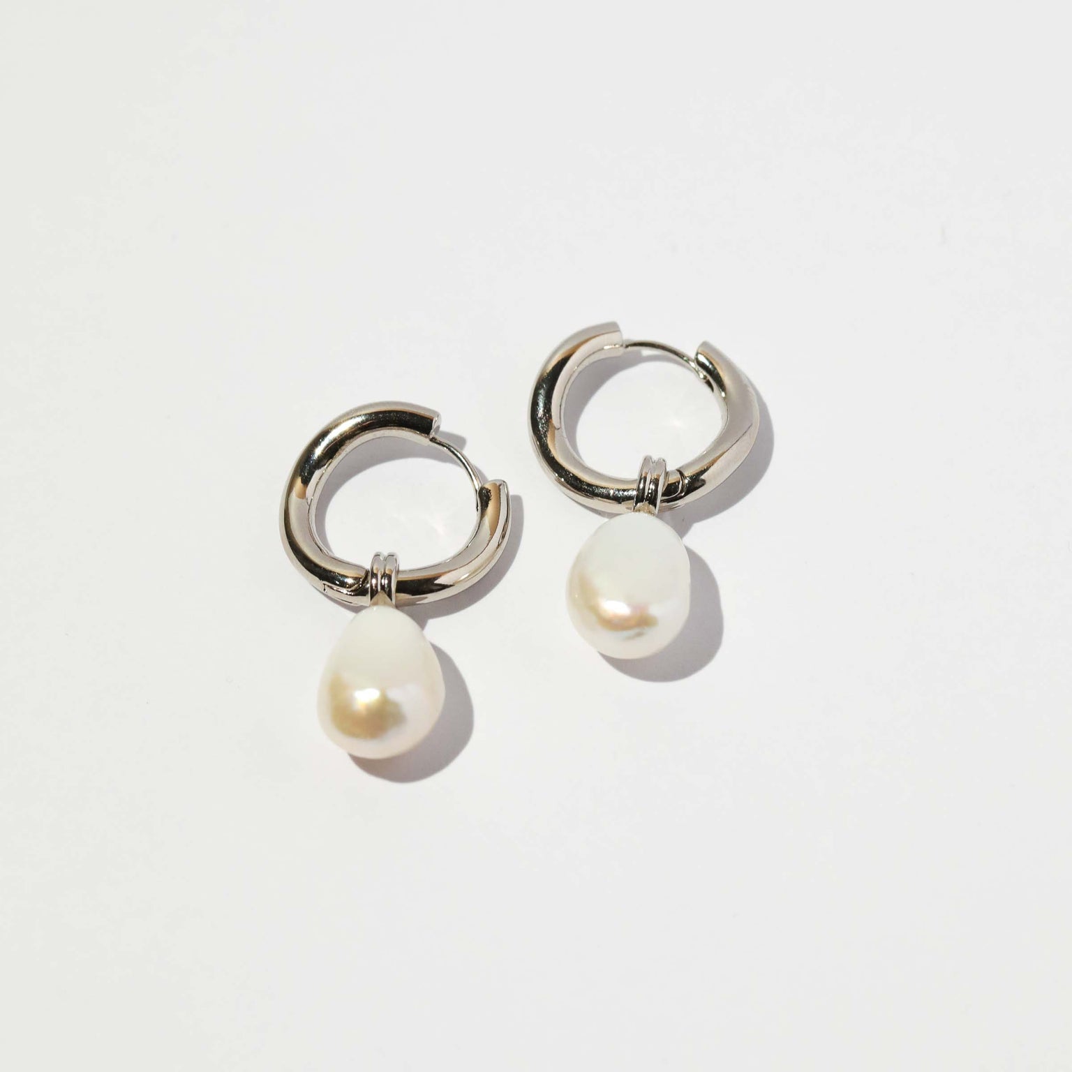 Astrid & Miyu | Elemental Huggies in Silver - 13mm | Twisted - Trendy Hoop Earrings for Her | Jewellery by Astrid & Miyu