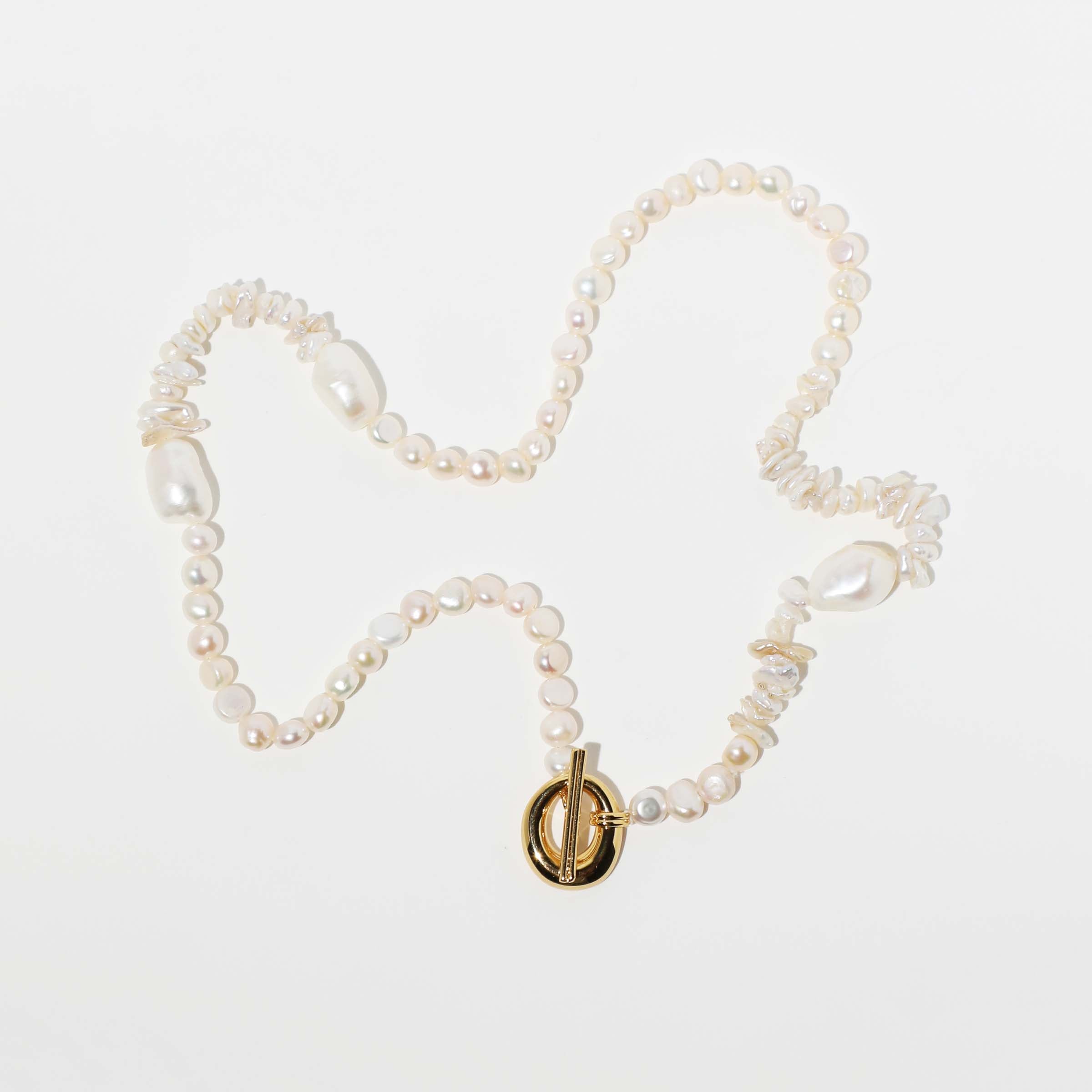 Serenity Pearl Beaded T-Bar Necklace in Gold flat lay