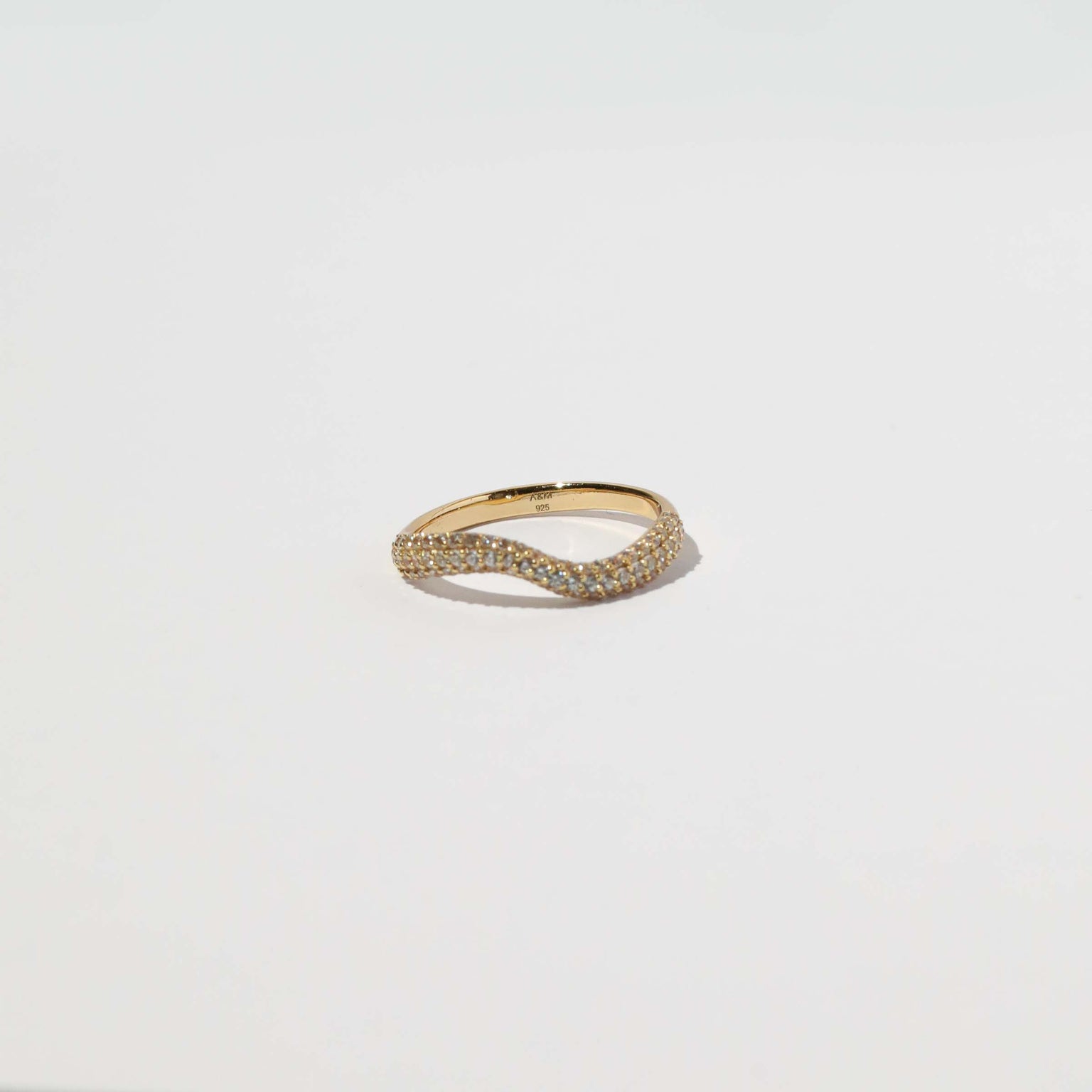 Wave Crystal Ring in Gold flat lay