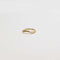 Wave Ring in Gold flat lay